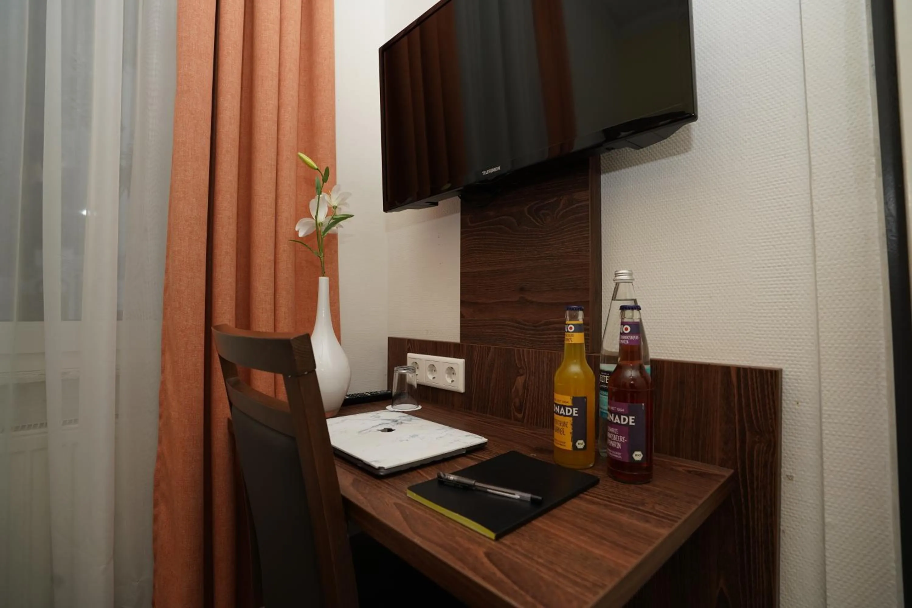 TV/Entertainment Center in Hotel Little Paris