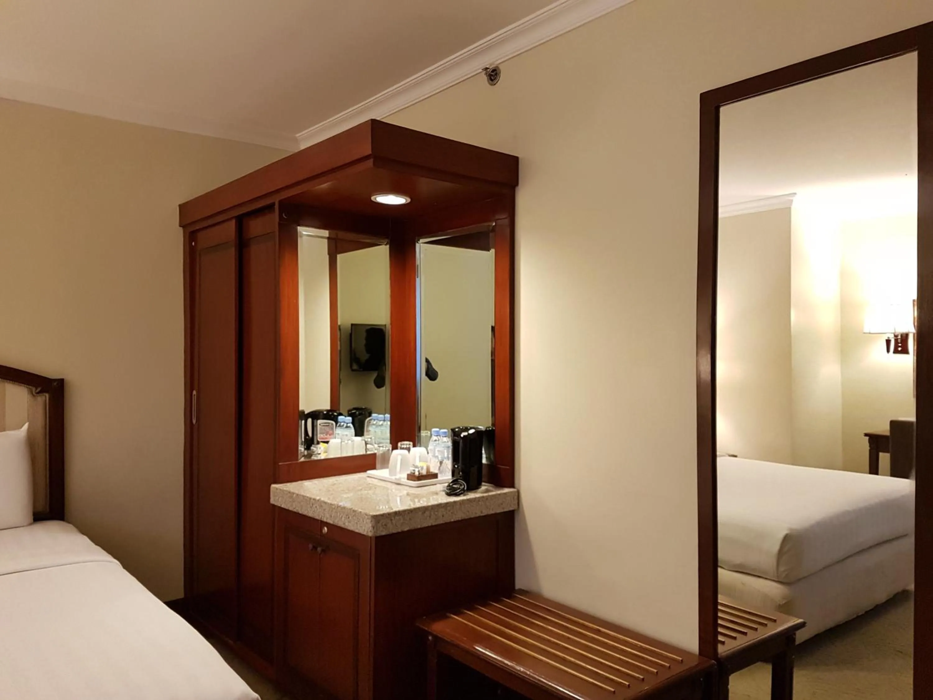 Bed in Cebu Parklane International Hotel