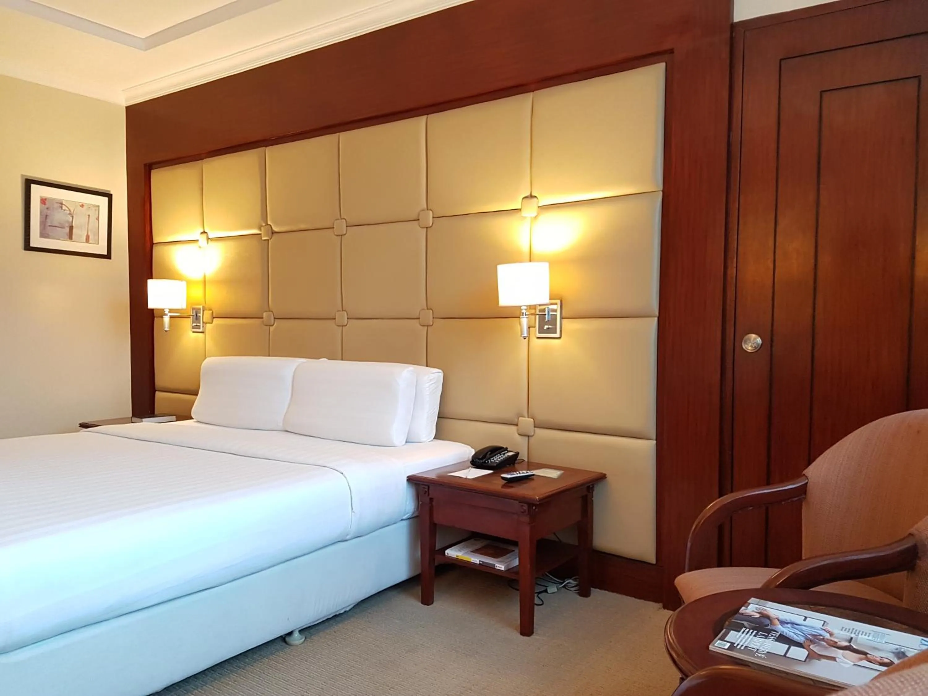 Bed in Cebu Parklane International Hotel