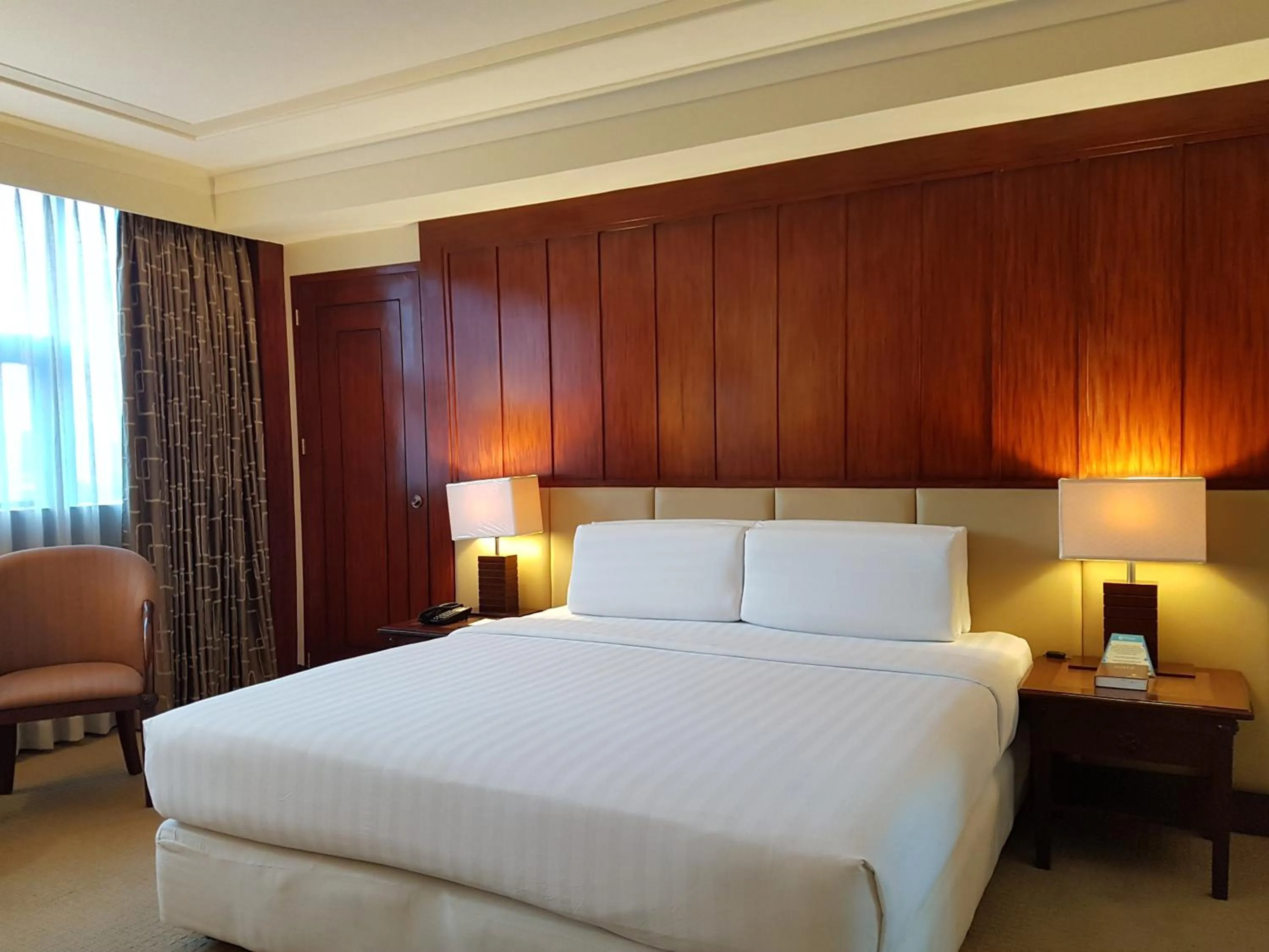 Bed in Cebu Parklane International Hotel