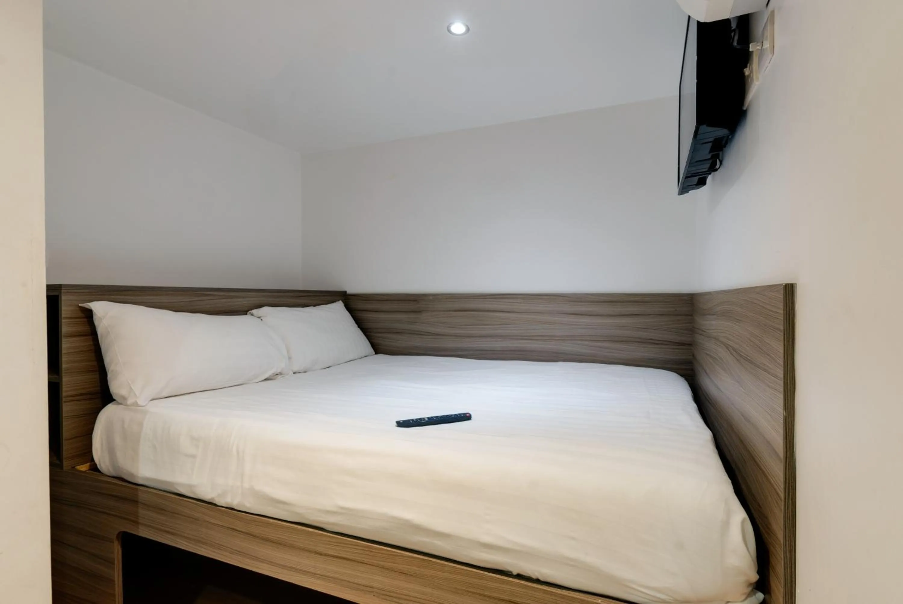 Bed in The Podworks Hotel