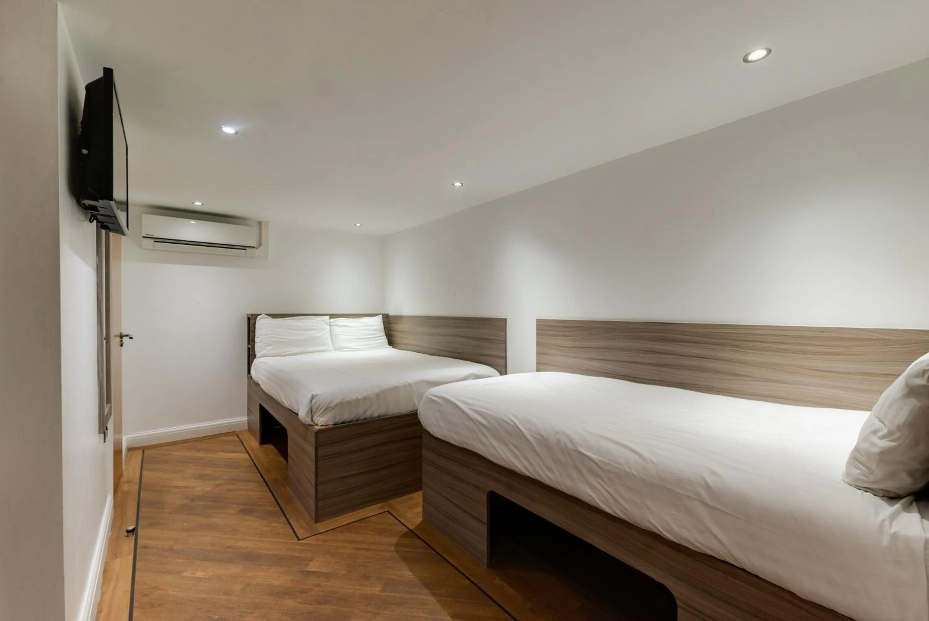 Bed in The Podworks Hotel