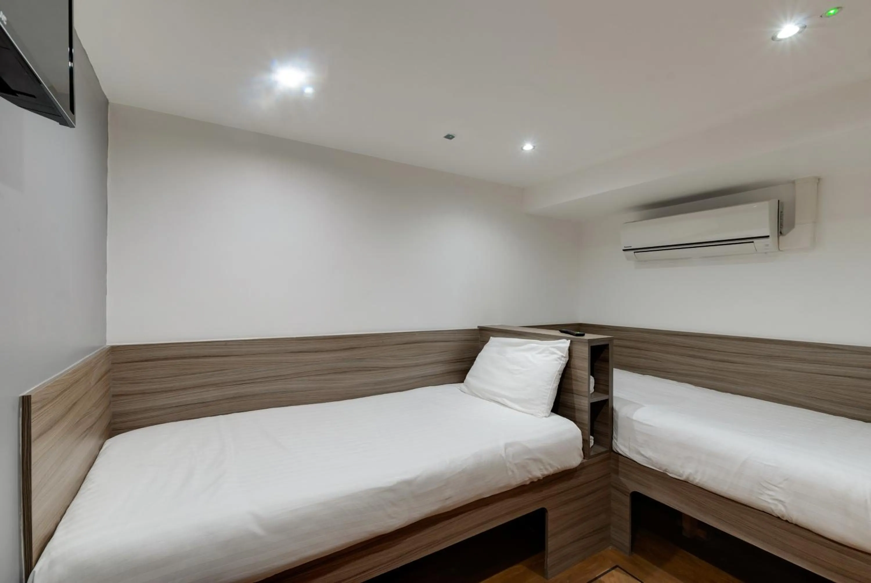 Bed in The Podworks Hotel