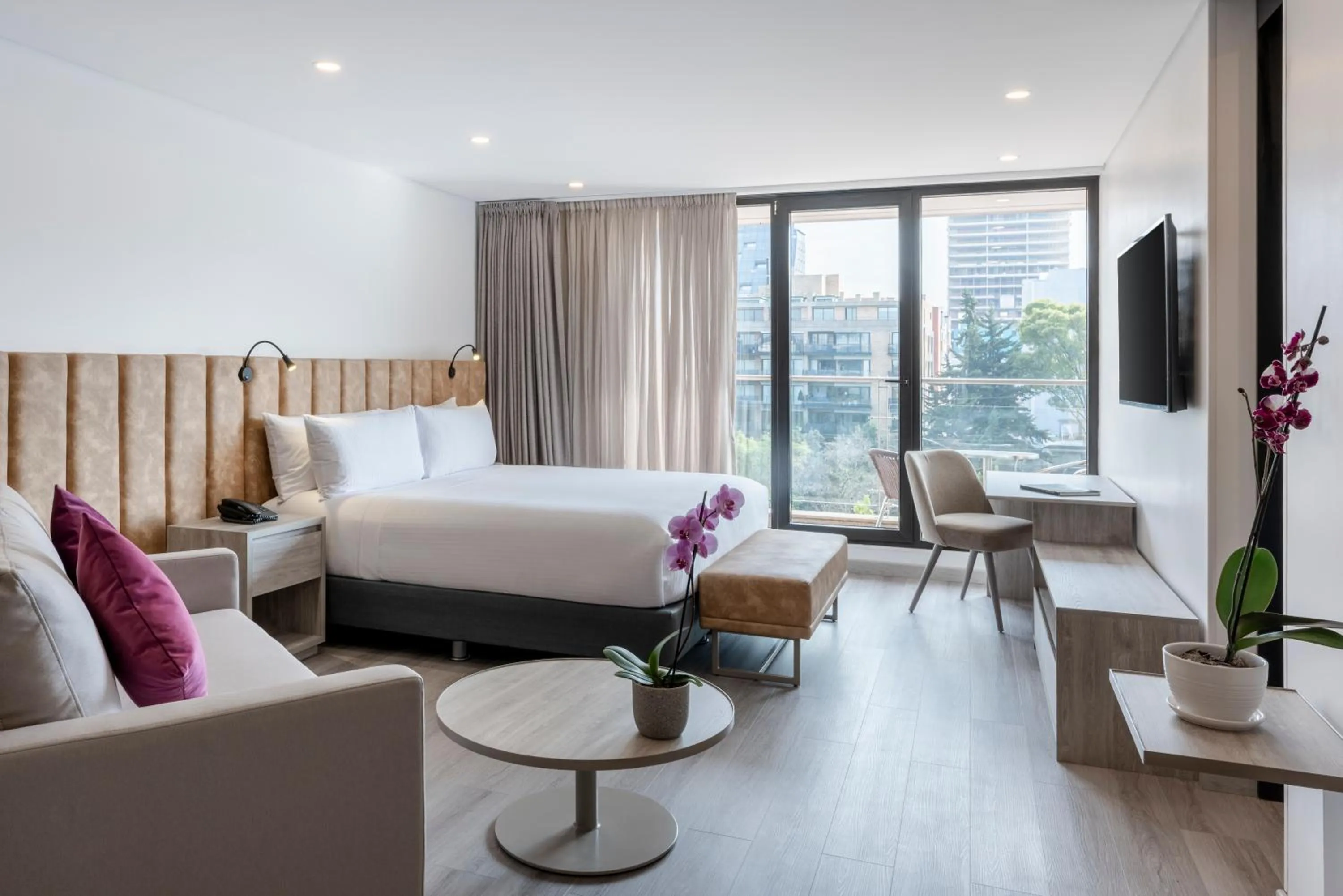 Bed in Hotel Jazz Apartments