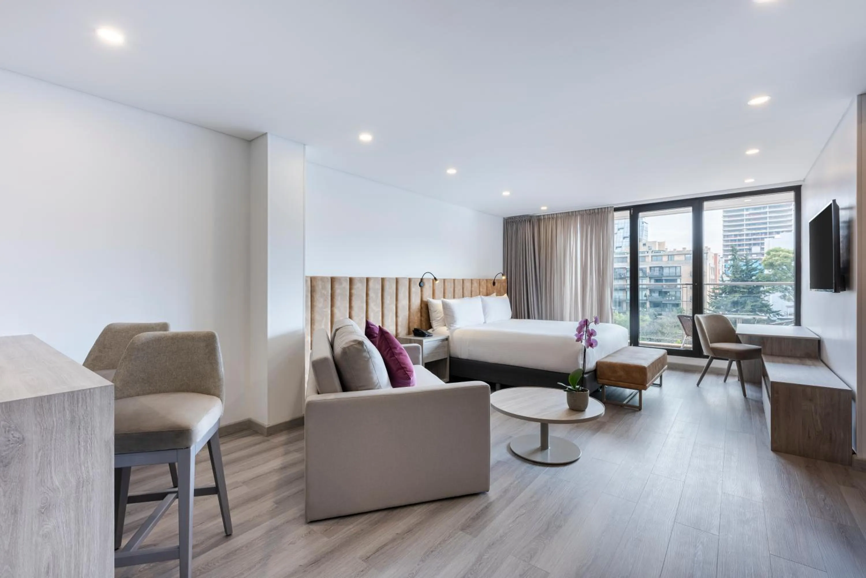 Bed in Hotel Jazz Apartments