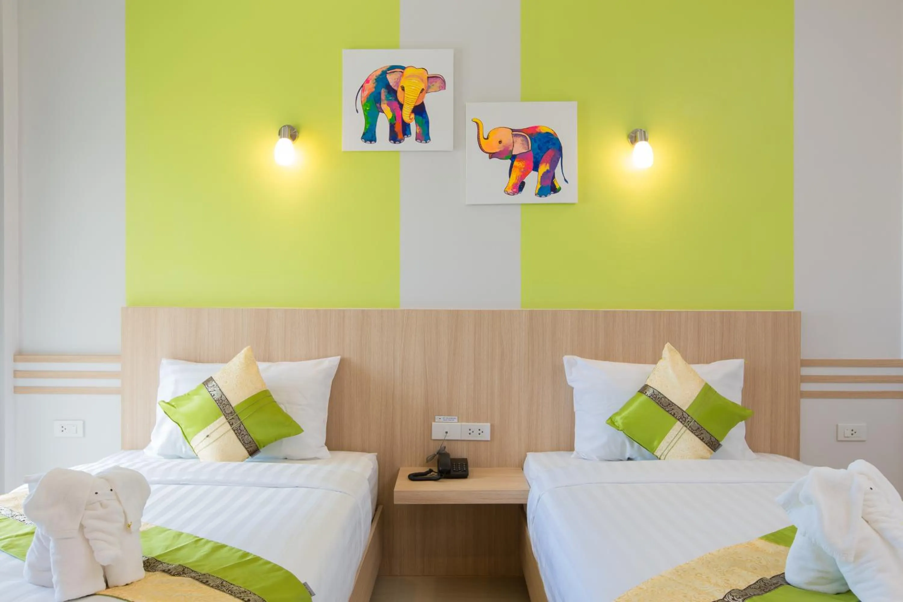 Bed in Phant at Thalang Service Apartment