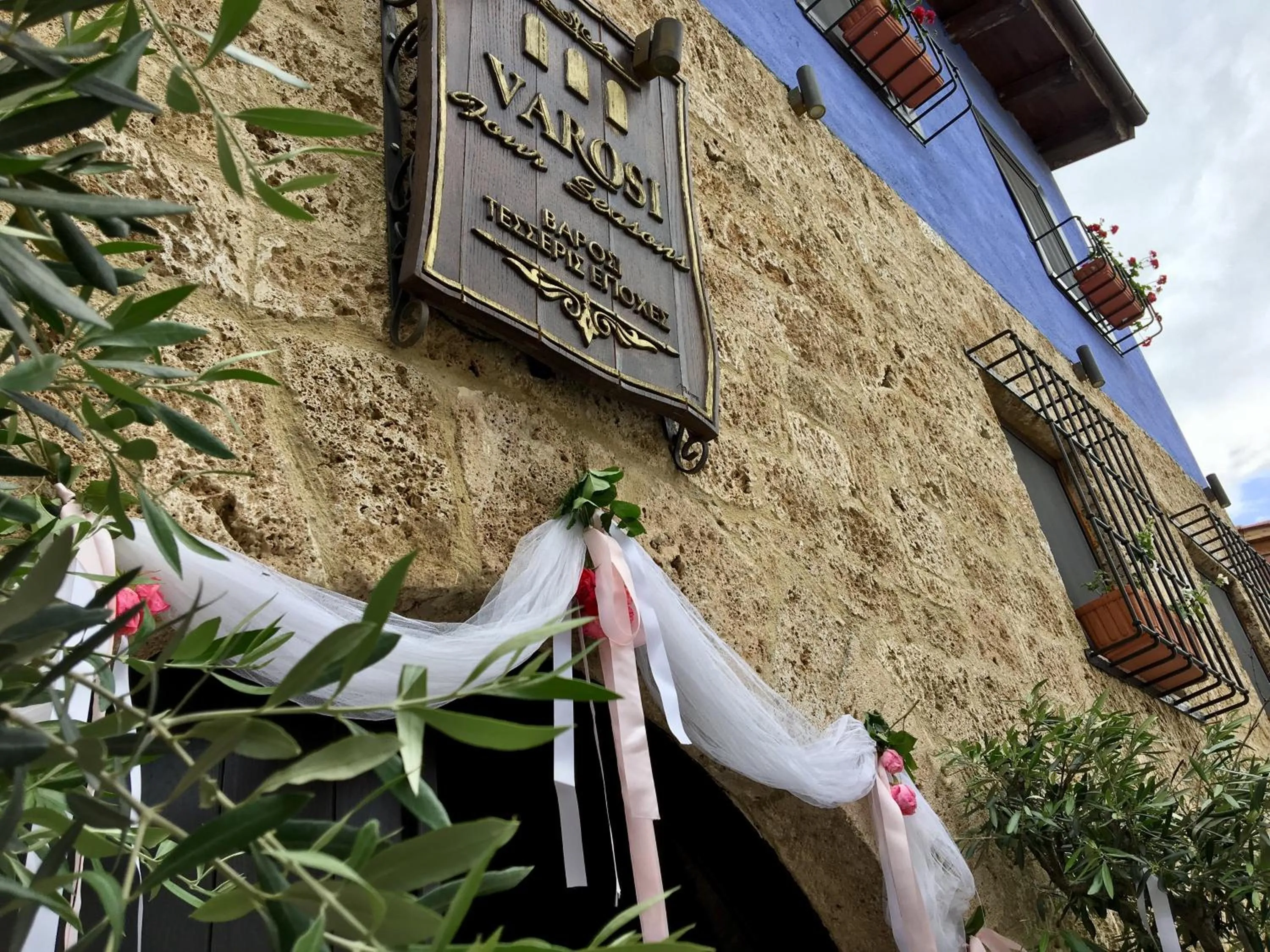 Property logo or sign in Varosi 4 Seasons