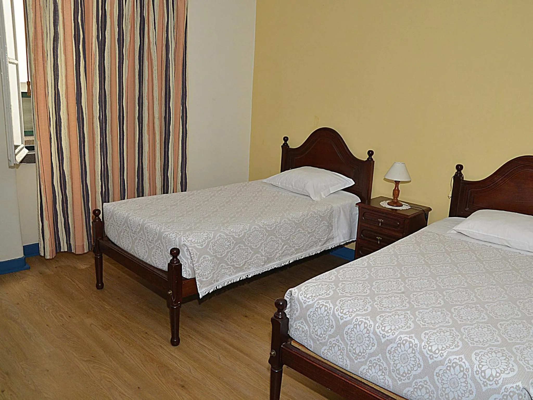 Photo of the whole room in Pensao Astoria