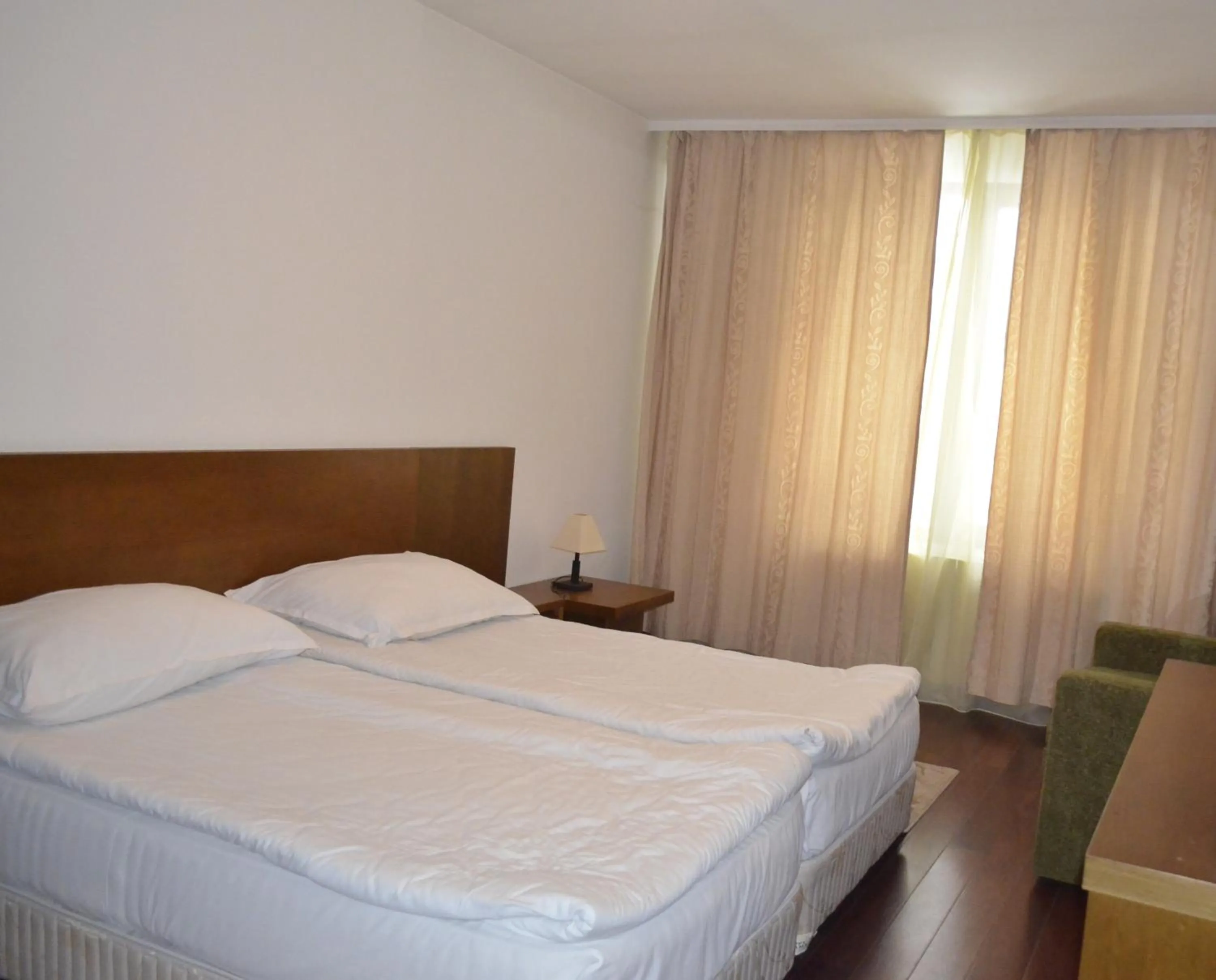 Bed in Bellevue Residence Apartments