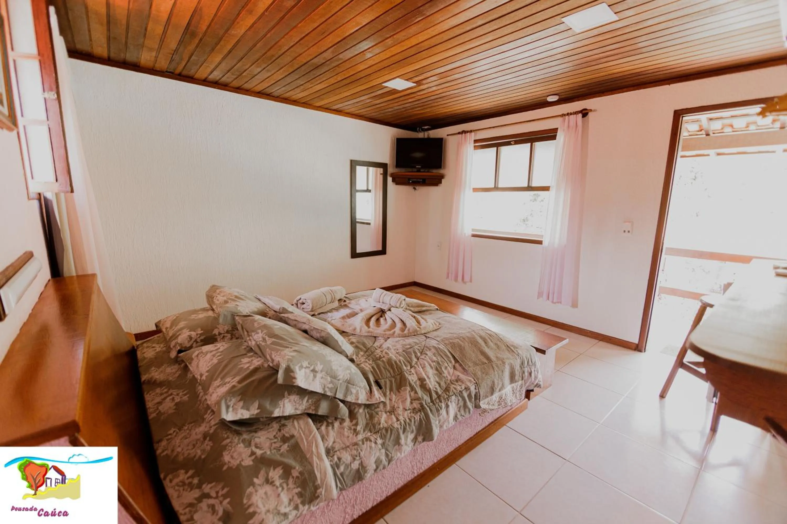 Bed in Pousada Caúca