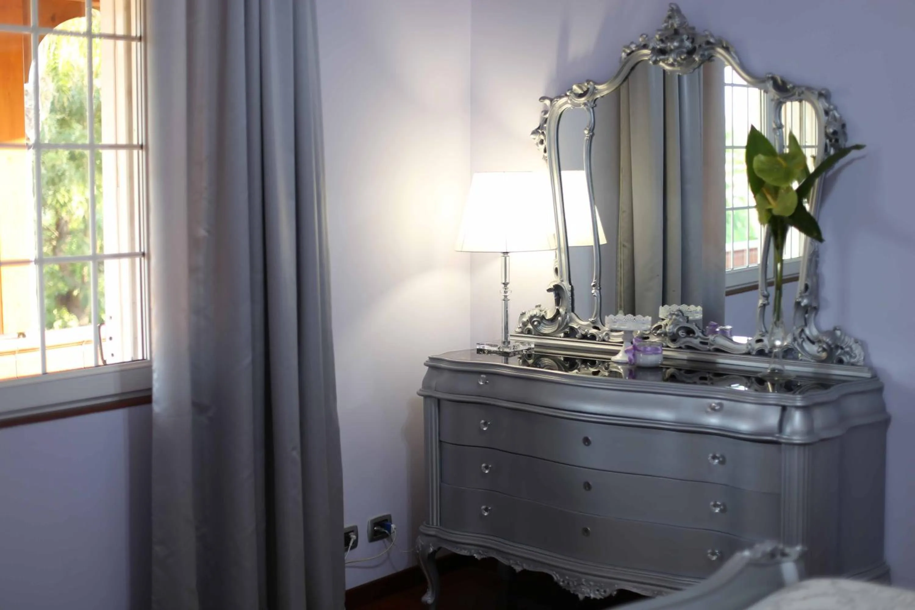 Photo of the whole room in HB Le suites del Giardino