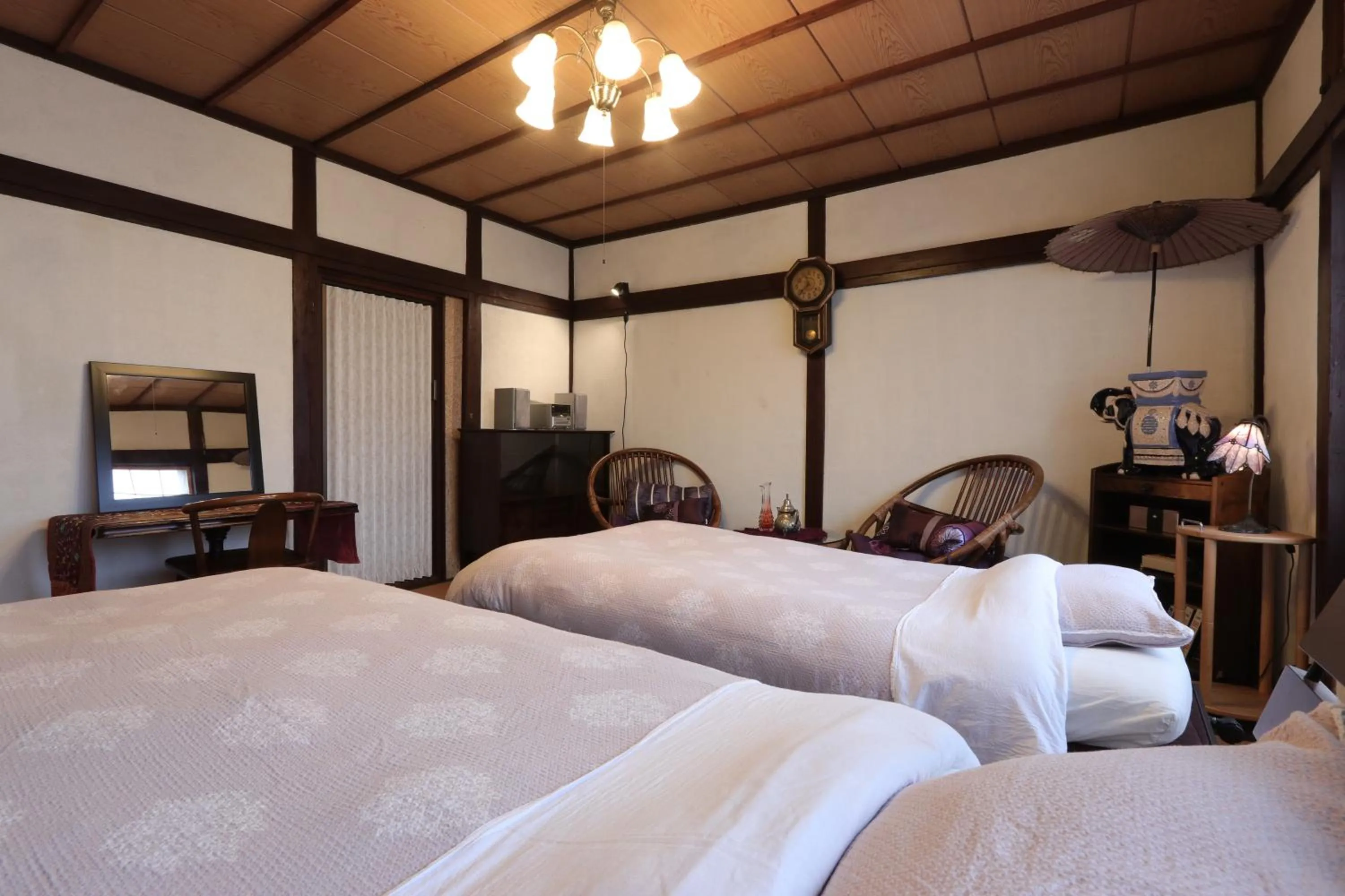 Bed in Shanti House Sakaiminato