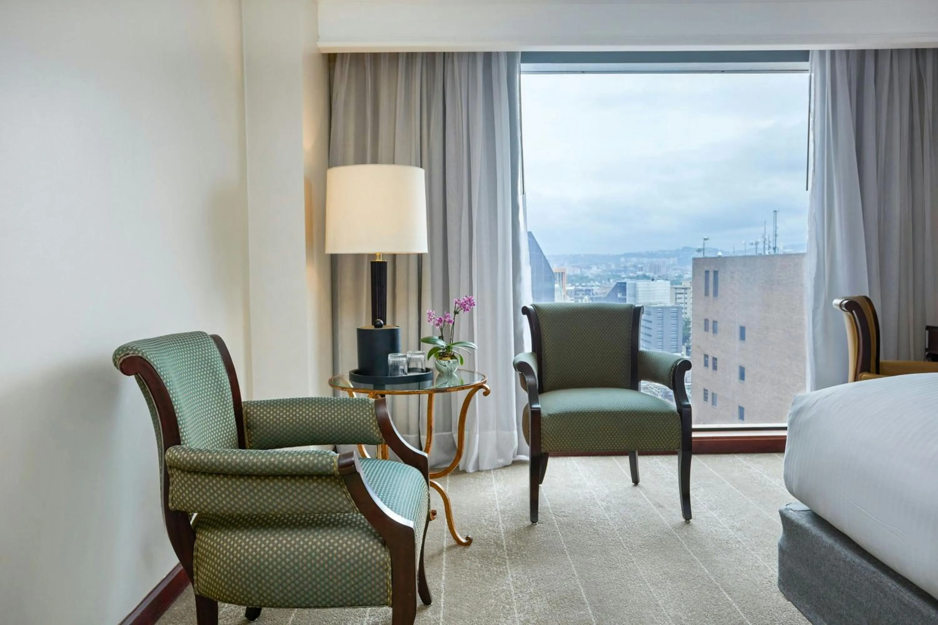 Photo of the whole room, Bed in JW Marriott Caracas