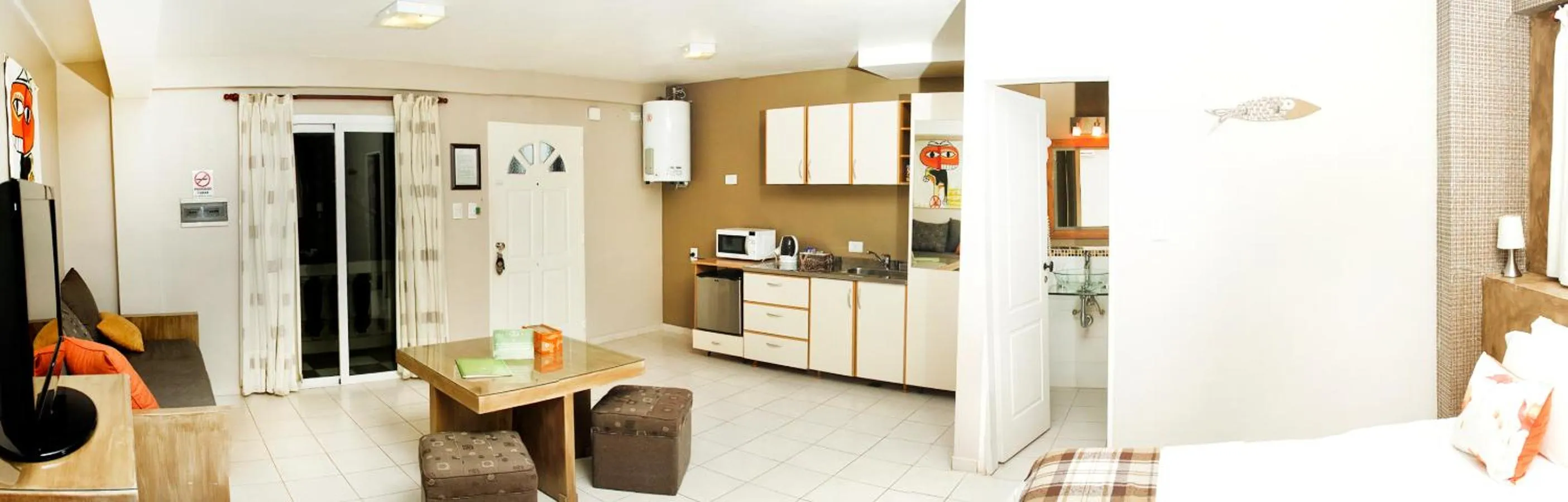 Seating area in La Rozada Suites