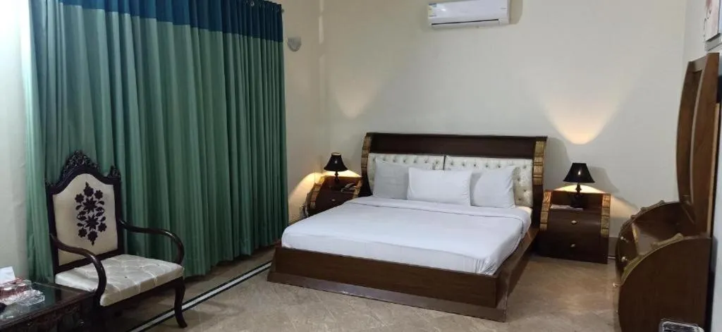 Bed in Executive Galaxy Guest House Islamabad