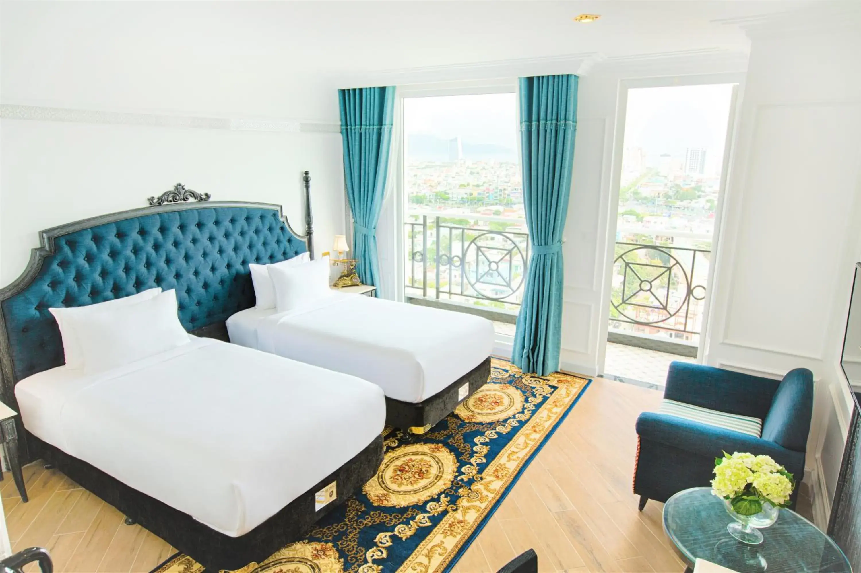 Deluxe Twin Room with Balcony and City View in Fivitel Da Nang Deluxe Twin Room with Balcony and City View in Fivitel Da Nang