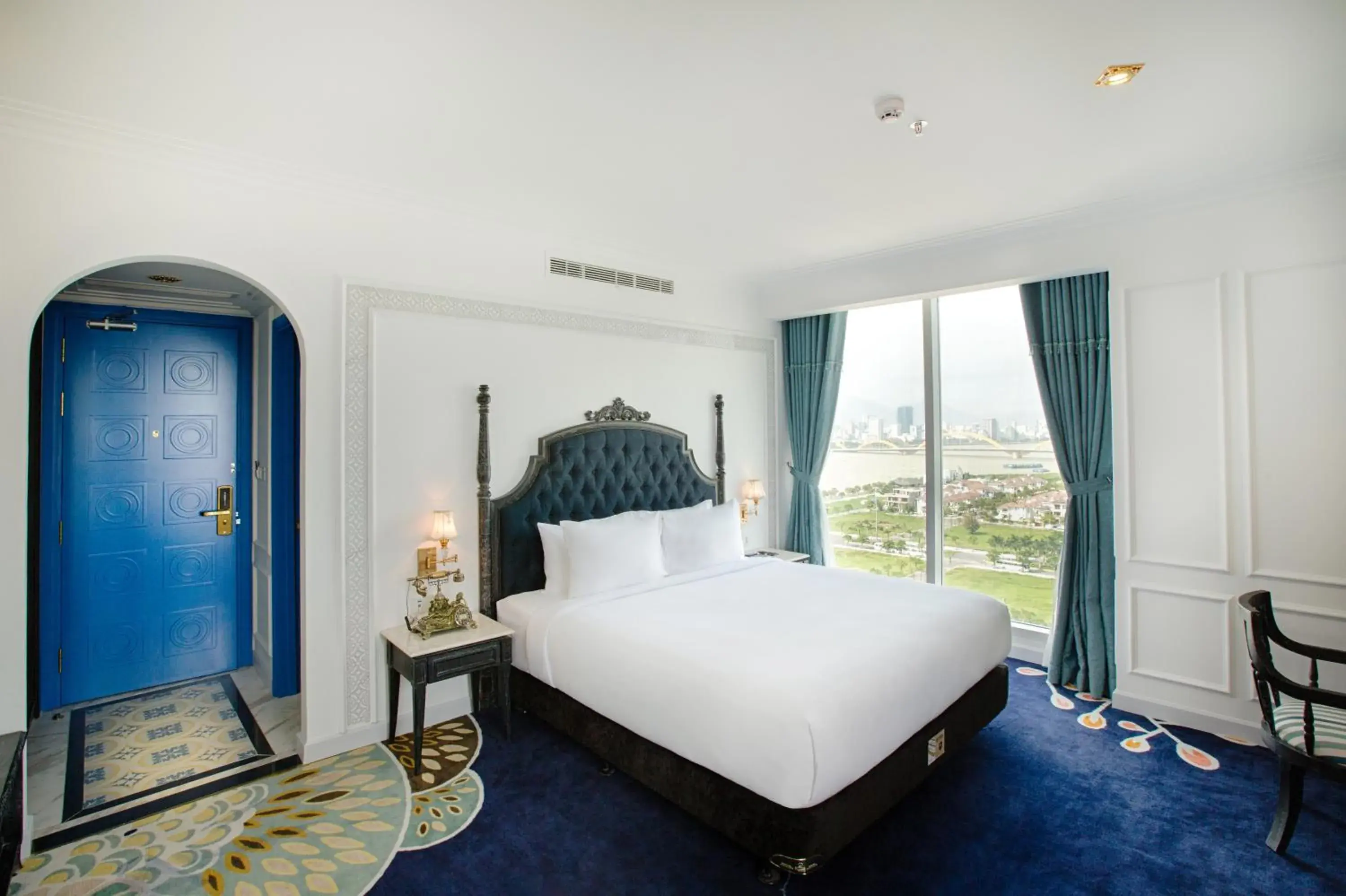 Deluxe King with Large Balcony and River view in Fivitel Da Nang Deluxe King with Large Balcony and River view in Fivitel Da Nang