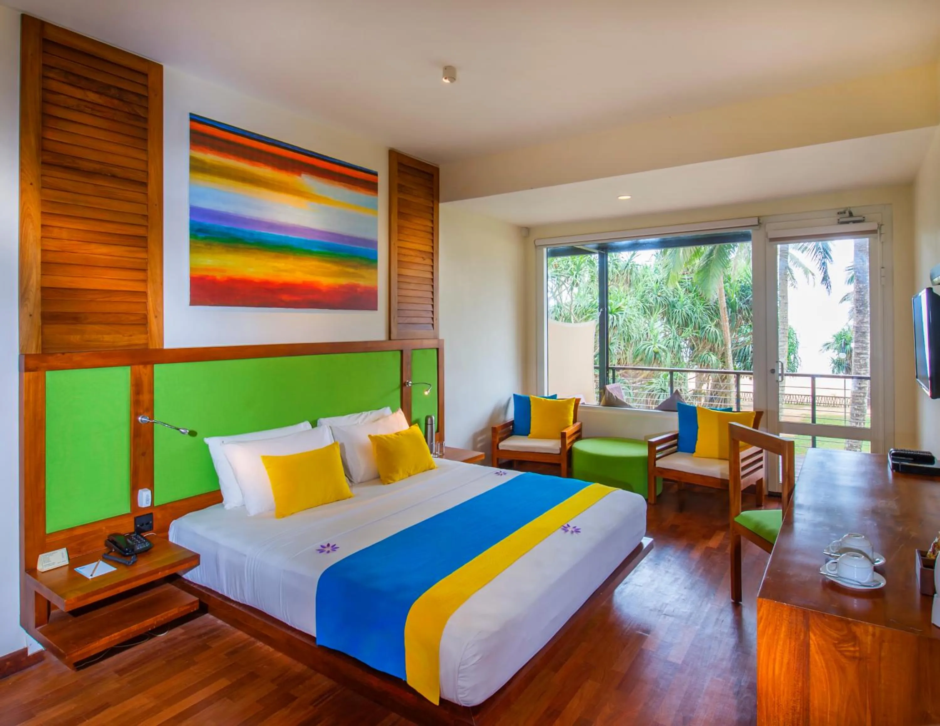 Seating area, Bed in Mermaid Hotel & Club