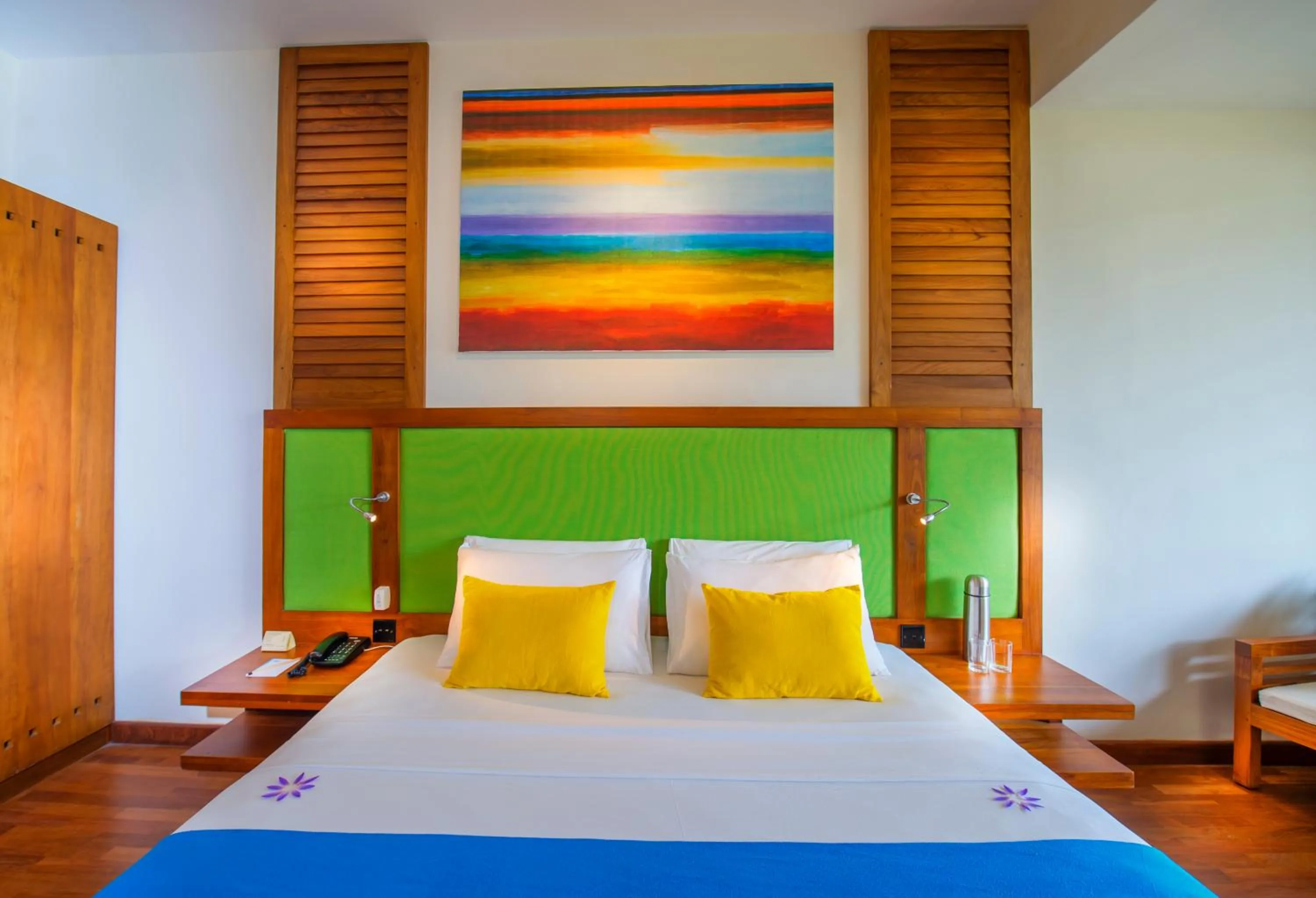 Bed in Mermaid Hotel & Club