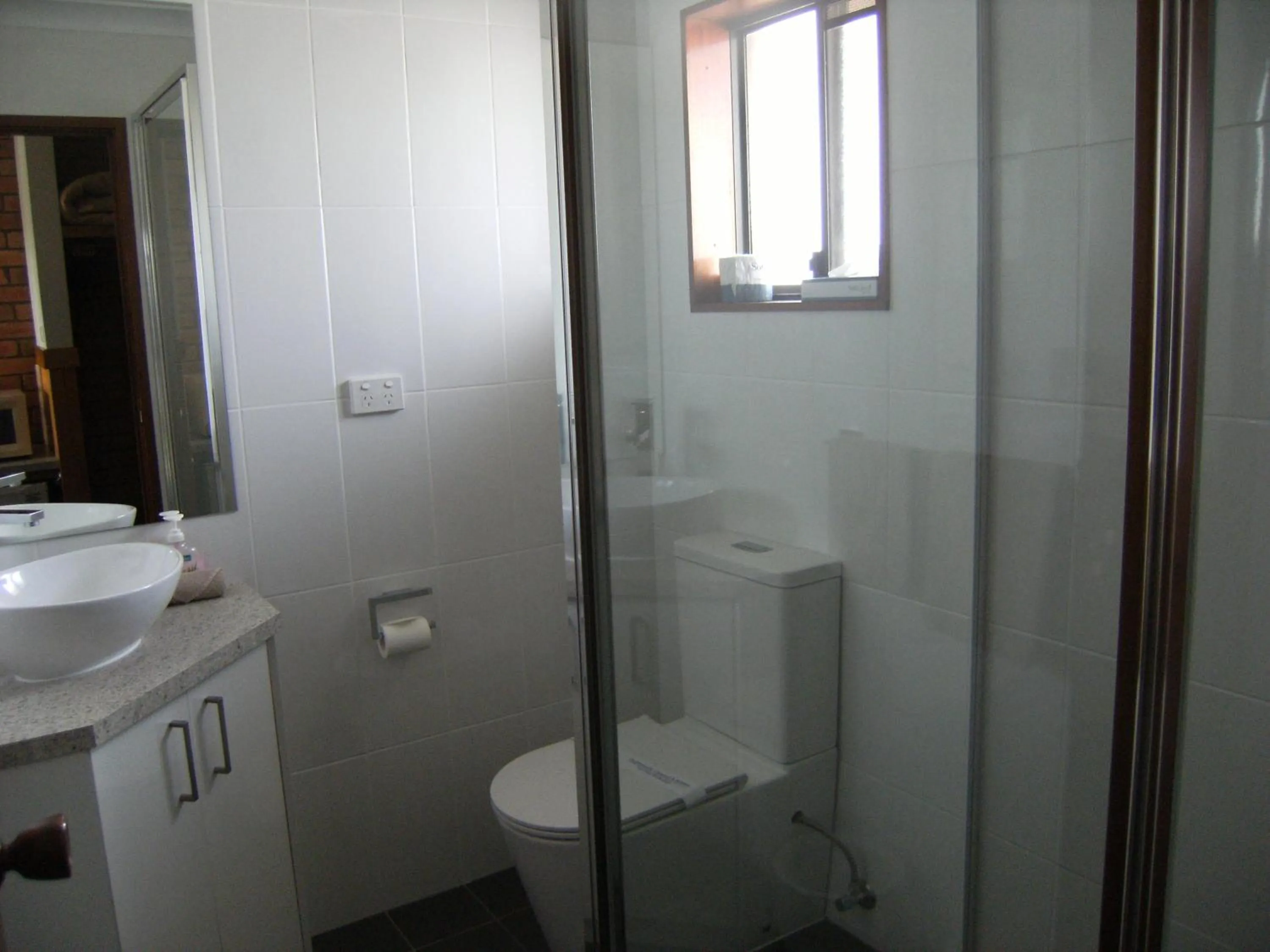 Toilet in Regency Court Motel