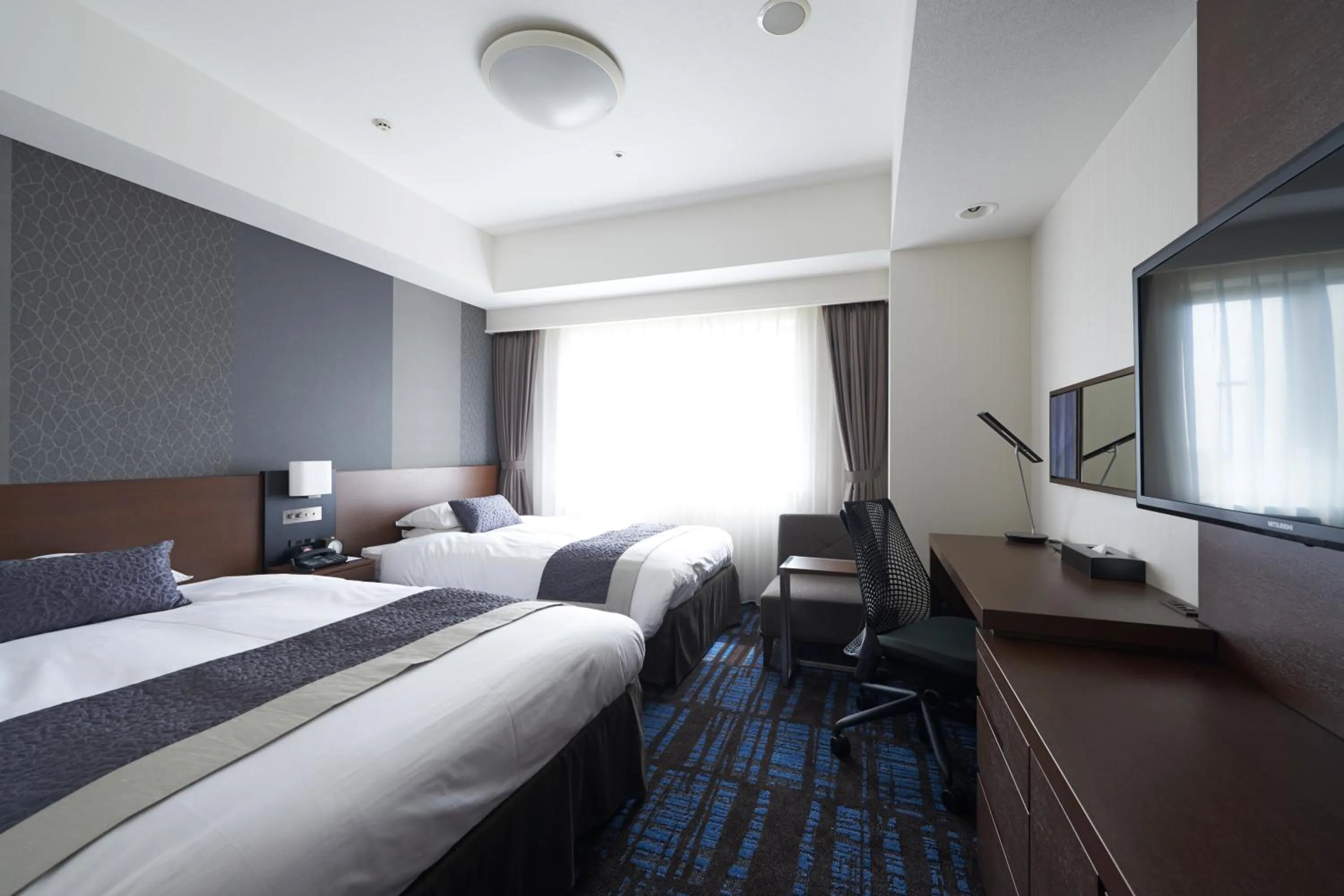 Photo of the whole room, Bed in Hopinn Aming