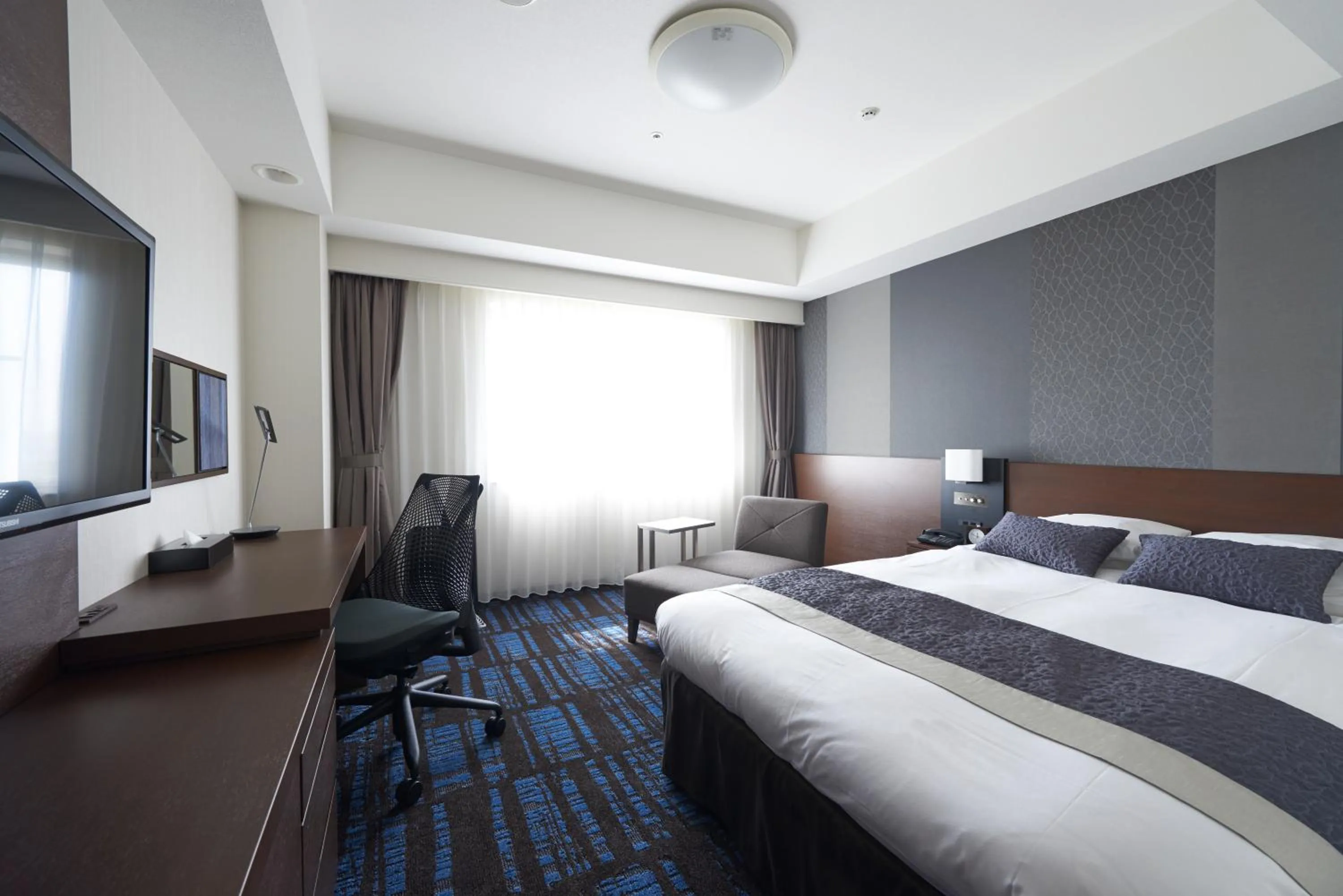 Photo of the whole room, Bed in Hopinn Aming