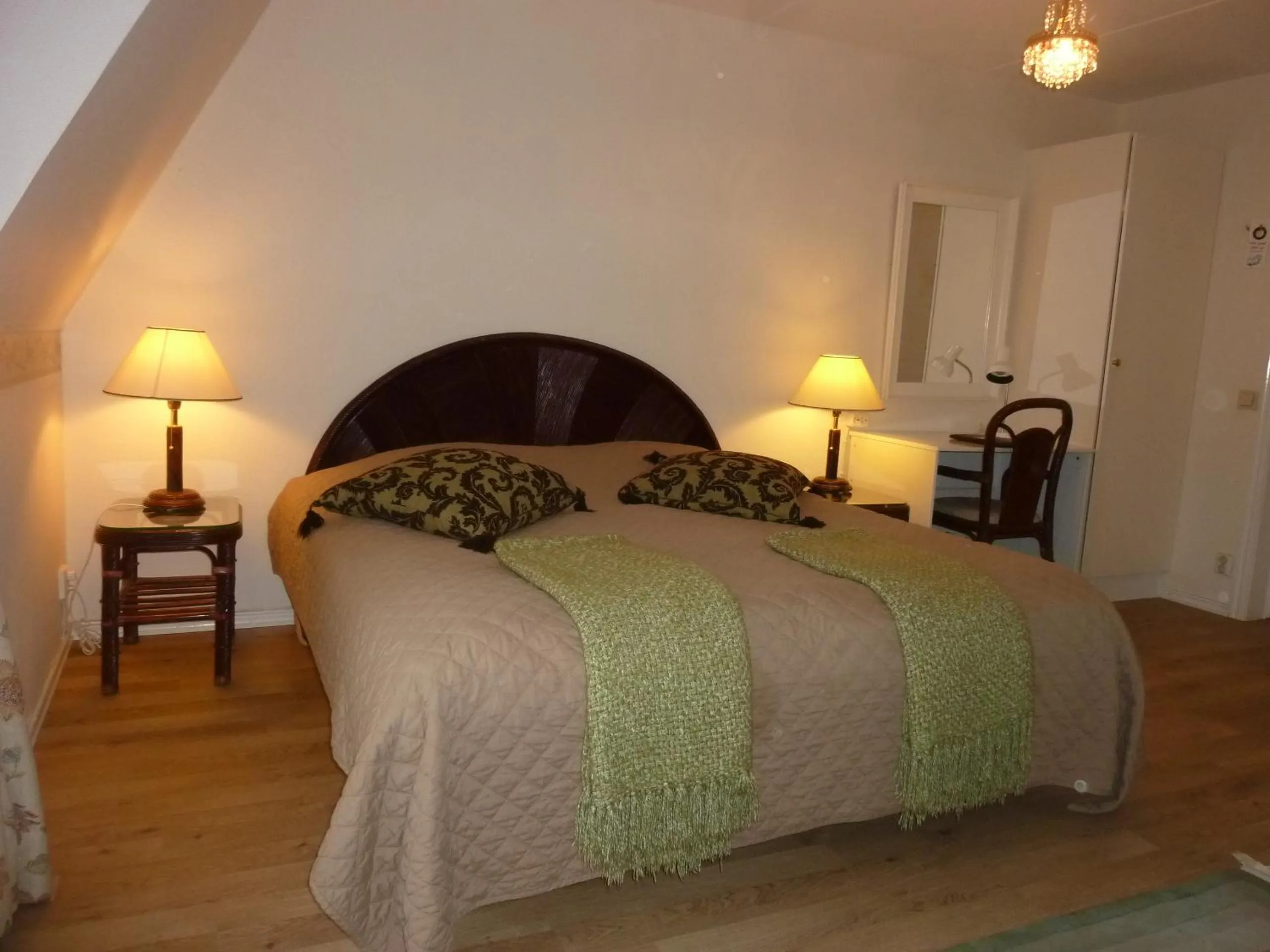 Bed in Nya Pallas Hotel