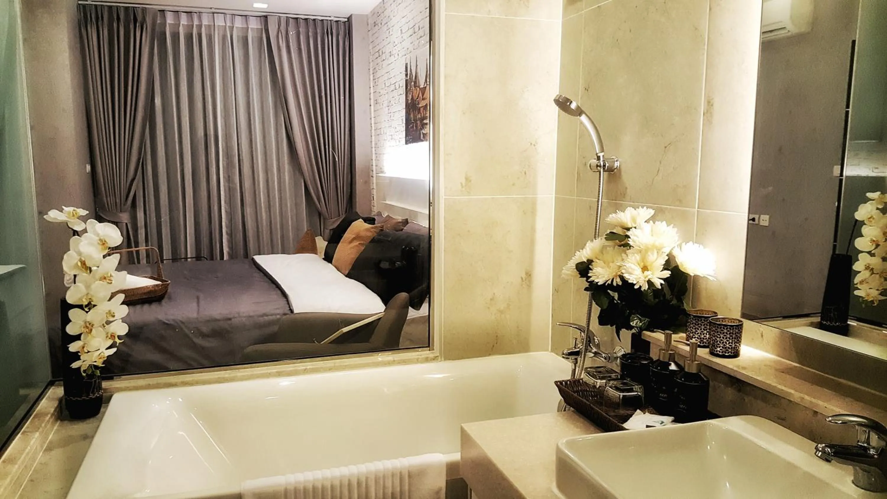 Bed in Astra Suites Night Bazaar