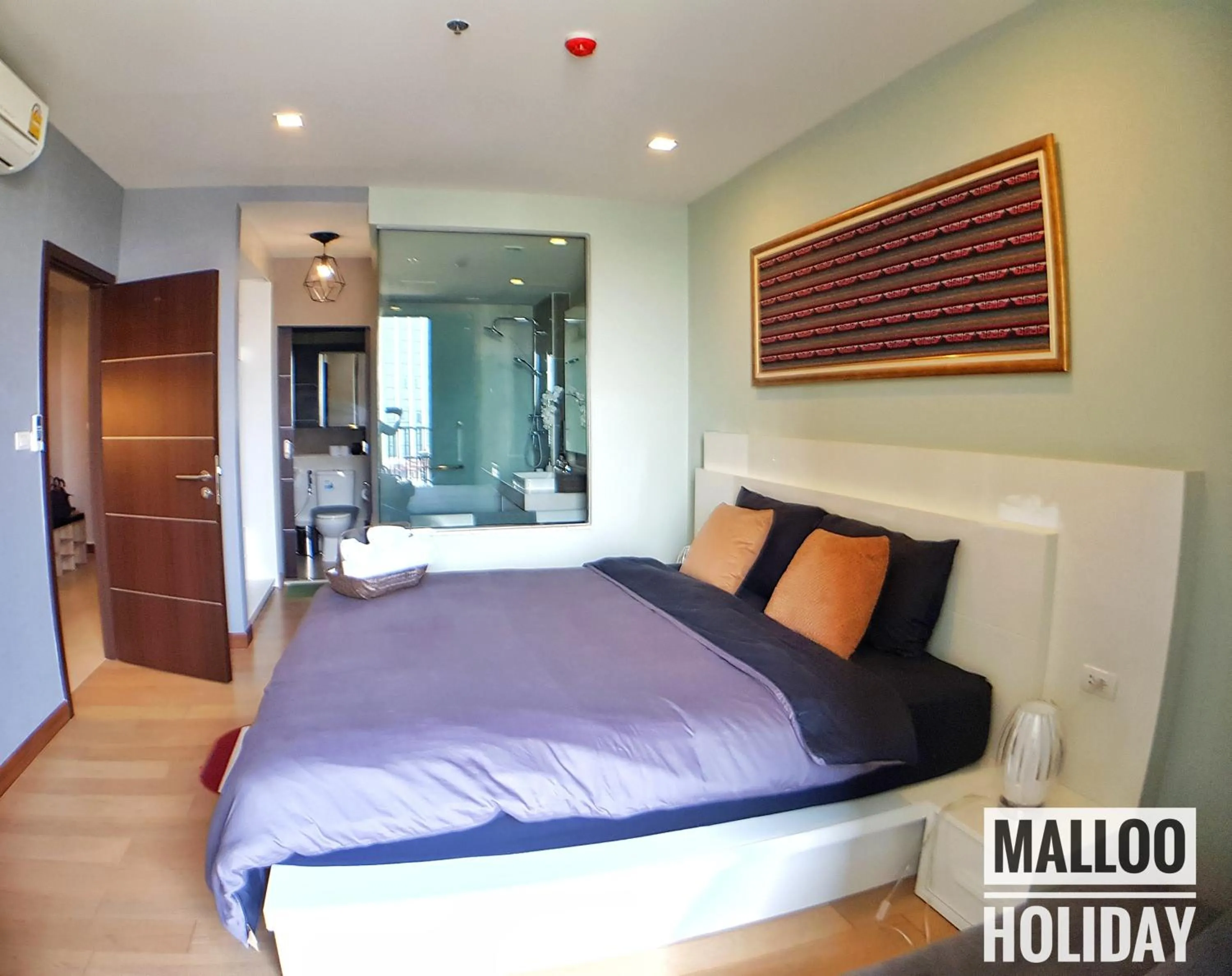 Bed in Astra Suites Night Bazaar