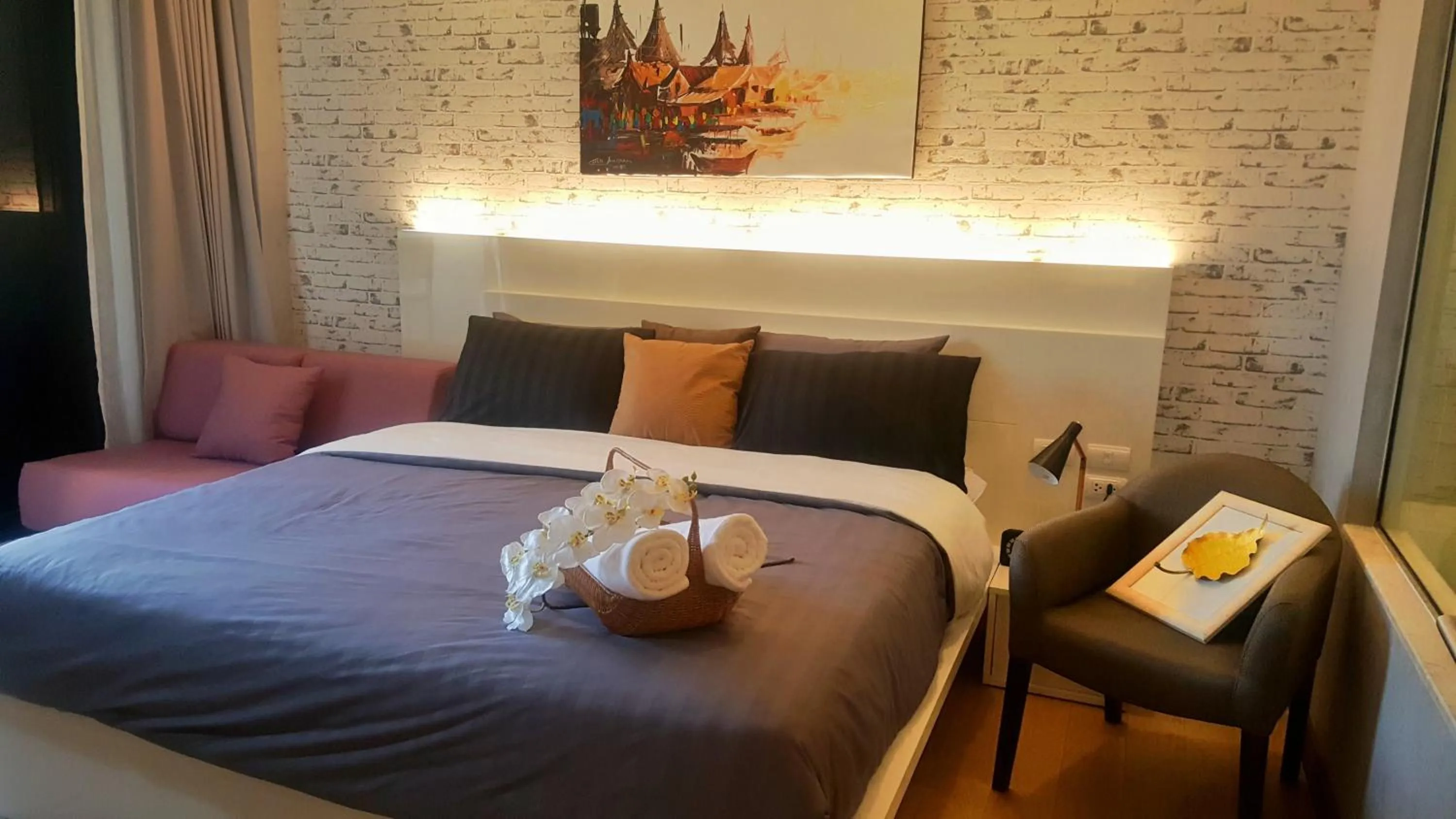 Bed in Astra Suites Night Bazaar