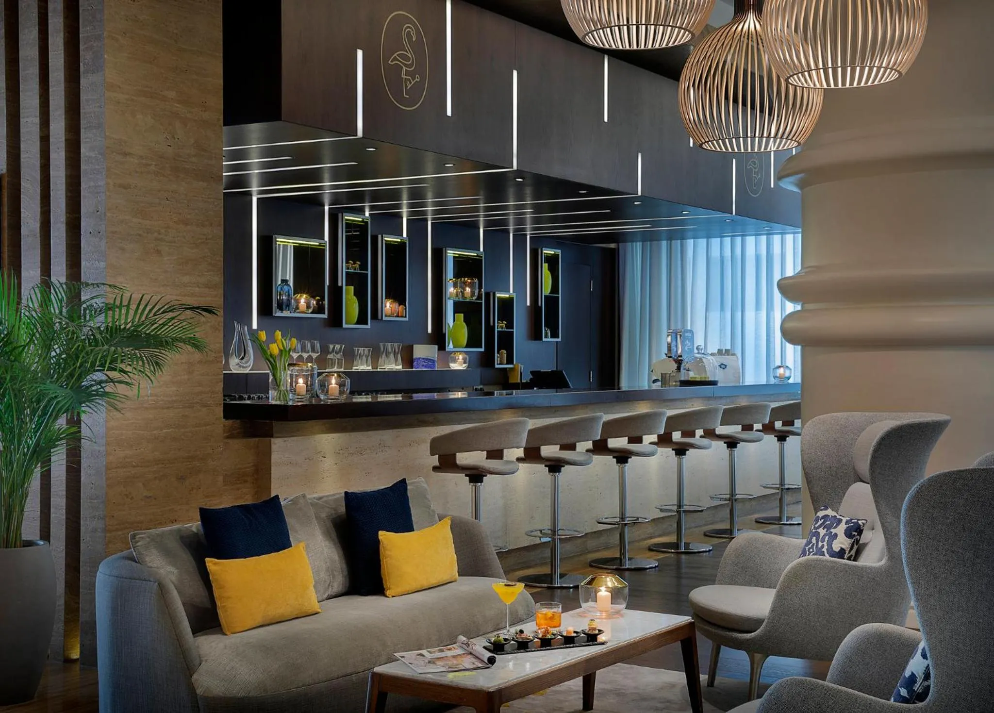 Lounge or bar in voco Dubai by IHG