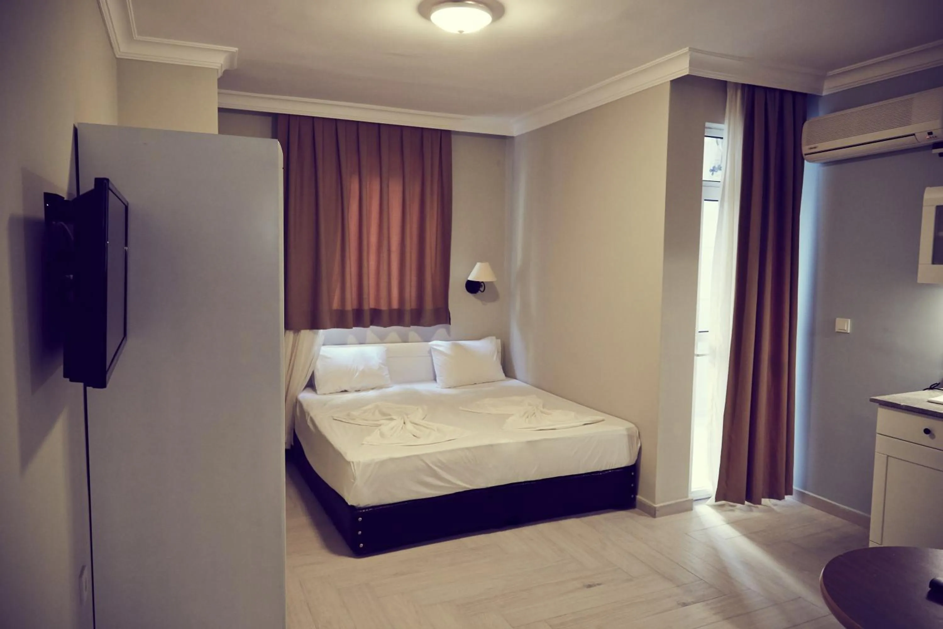 Bed in Two Seas Hotel