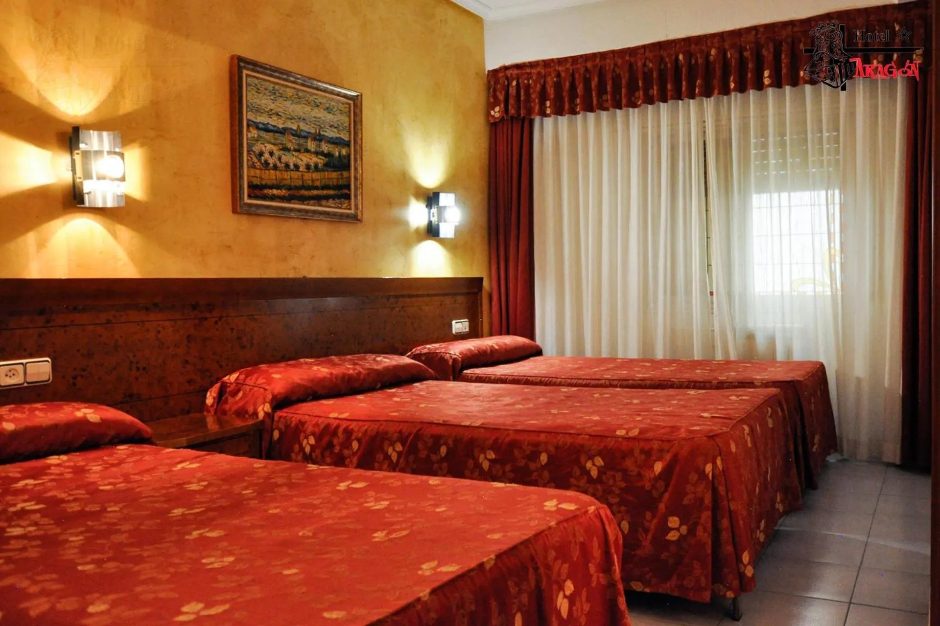 Bed in Hotel Aragón