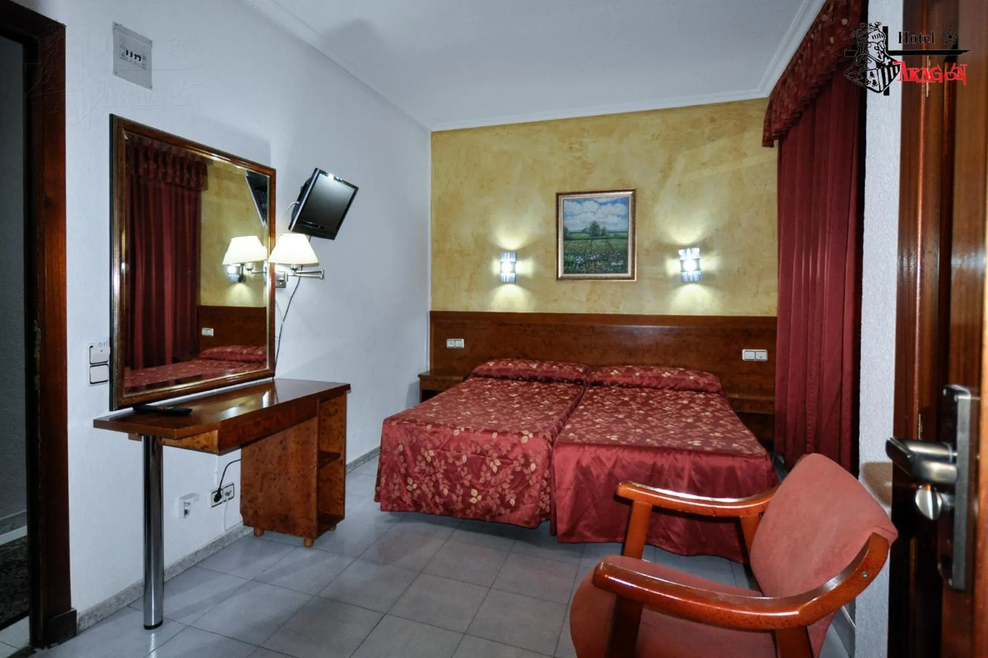 Bed in Hotel Aragón