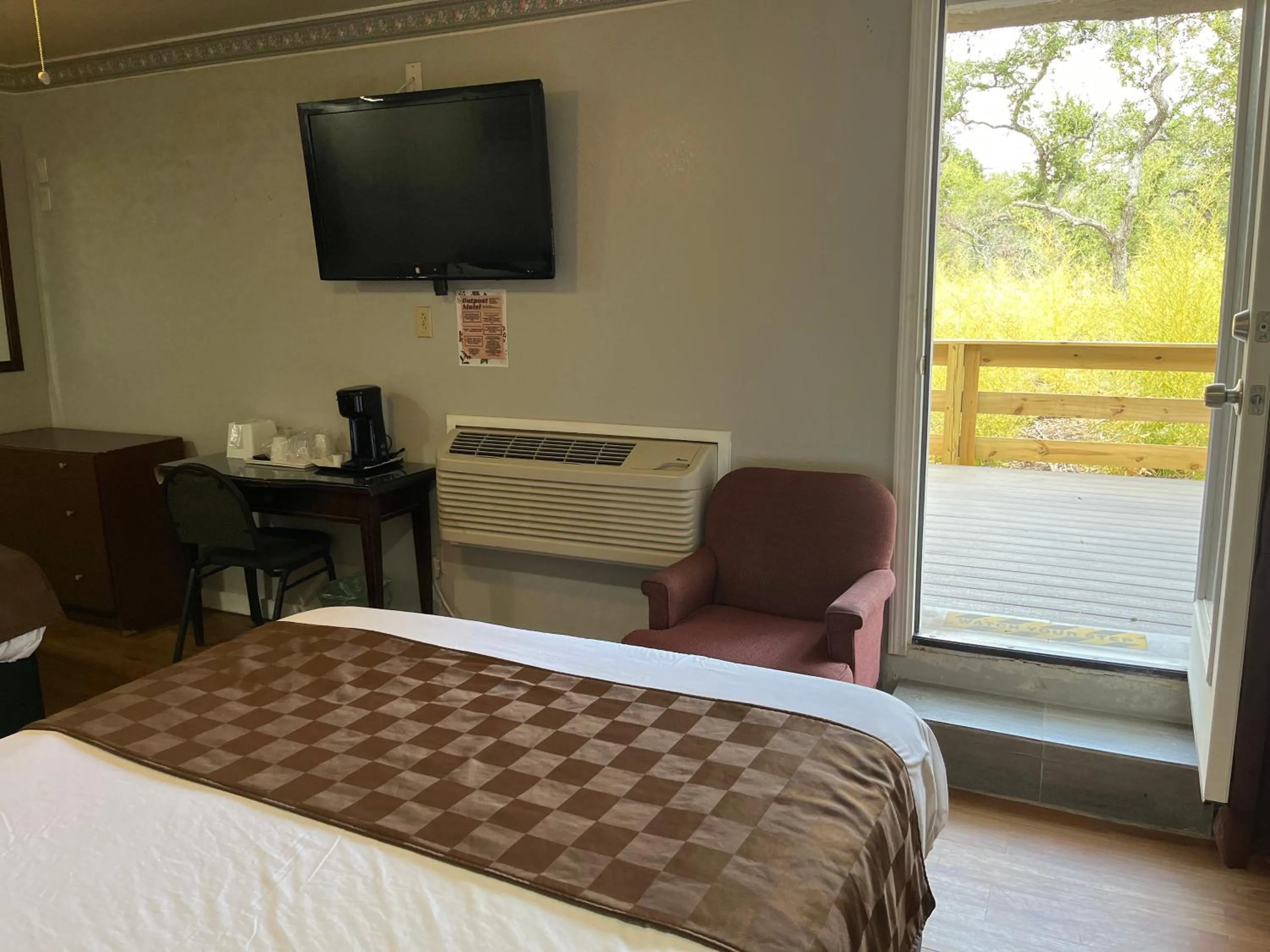 Bed in Outpost Motel