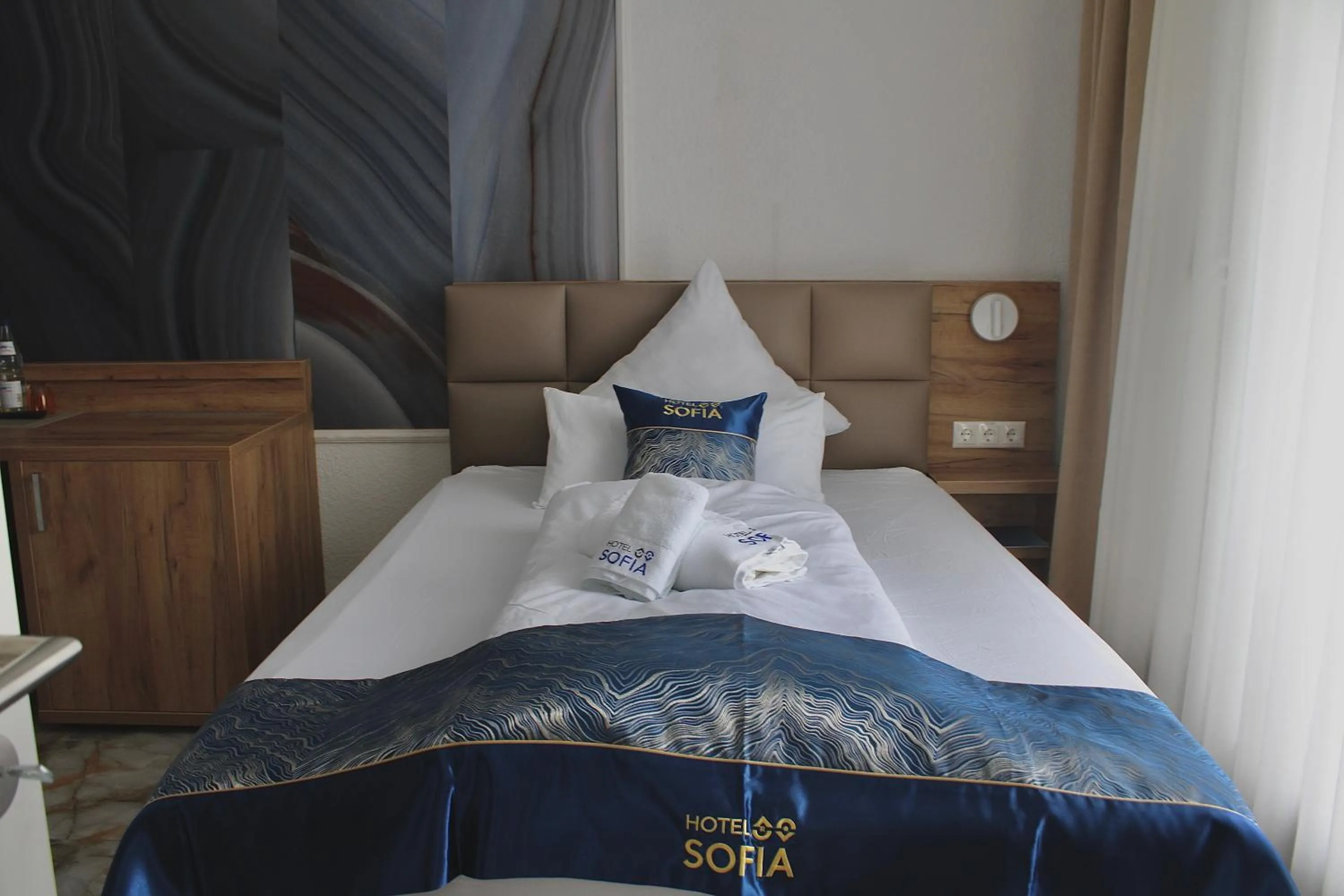 Bed in Hotel Sofia