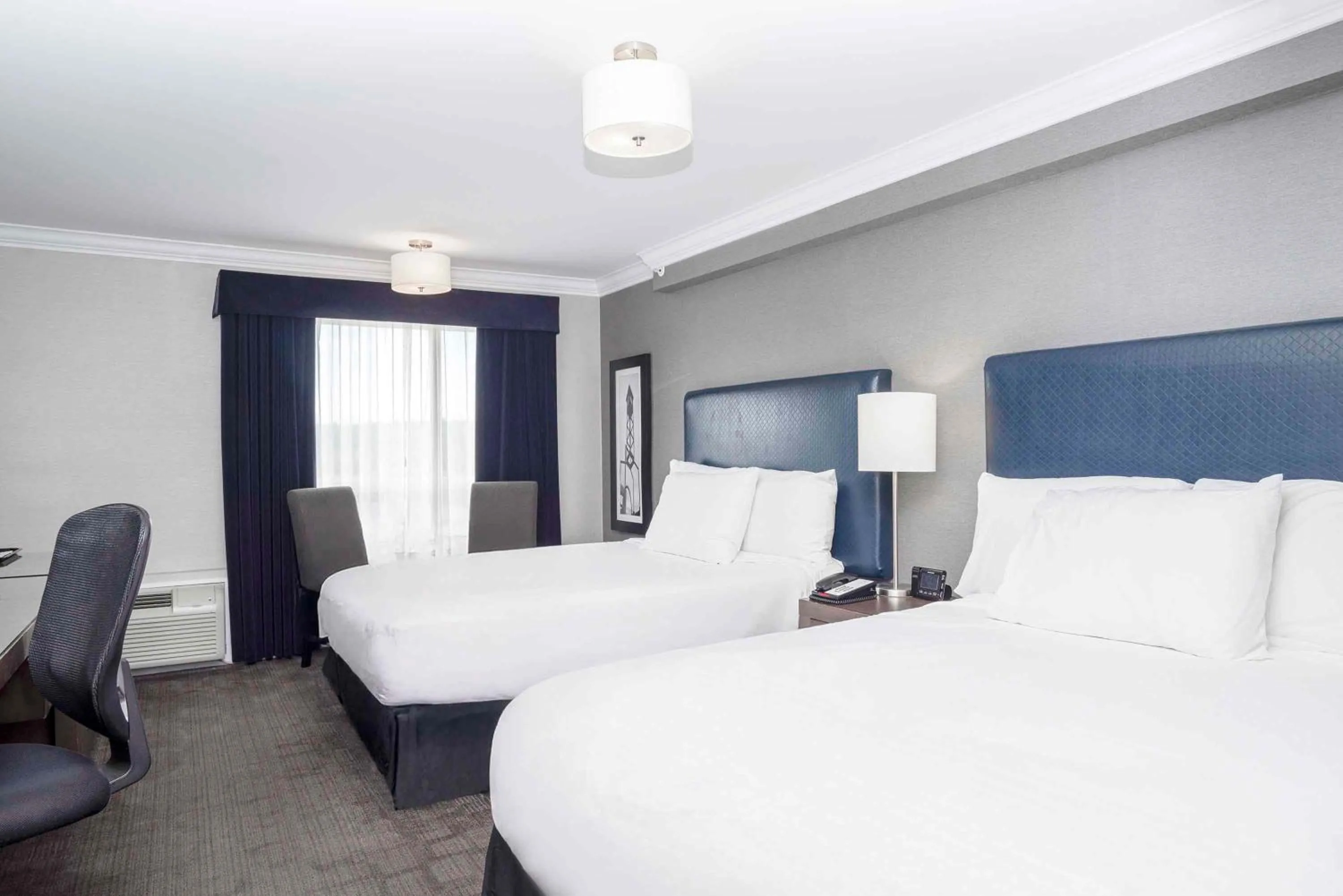 Photo of the whole room, Bed in Sandman Signature Prince George Hotel