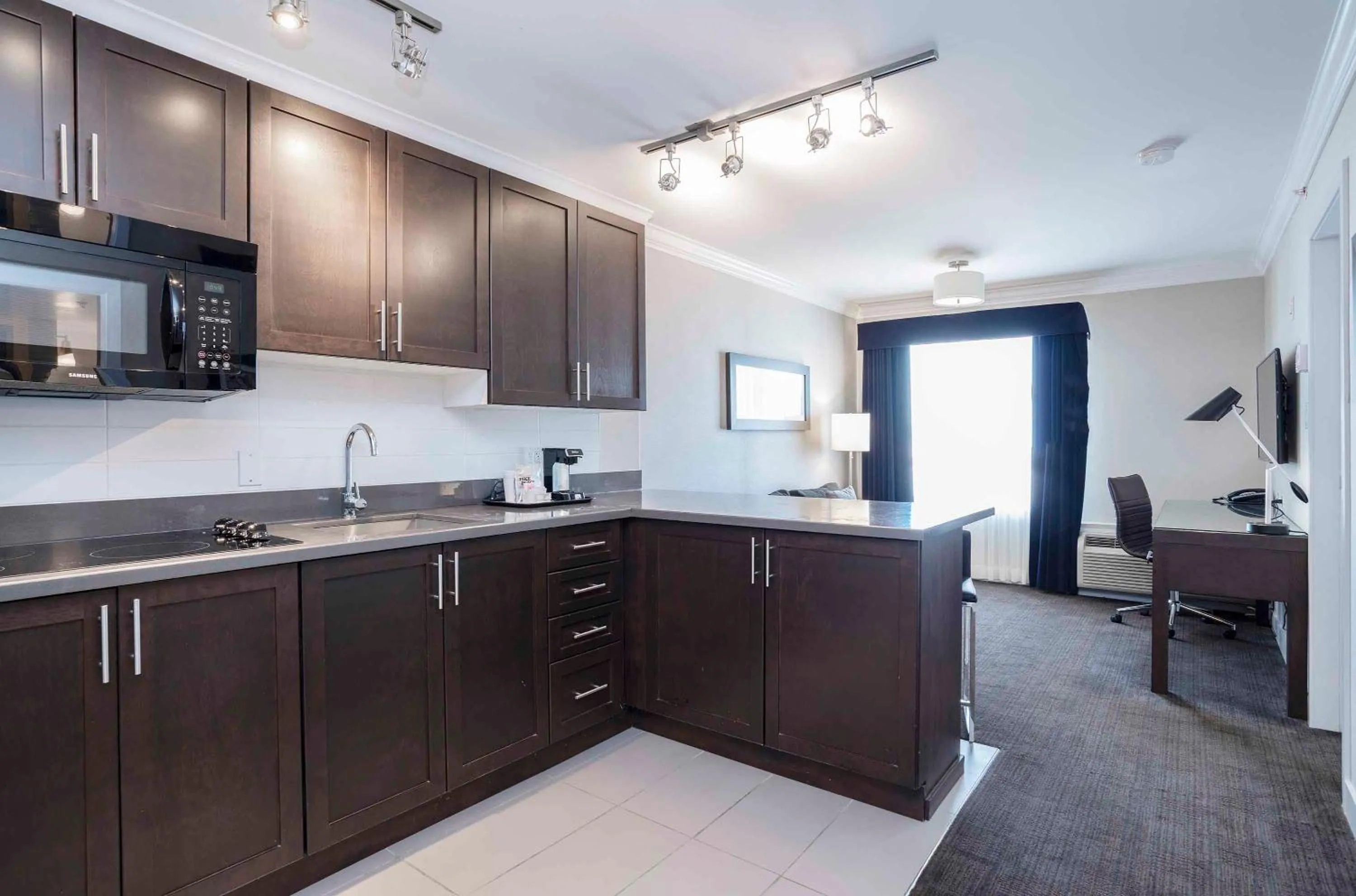 Kitchen or kitchenette in Sandman Signature Prince George Hotel