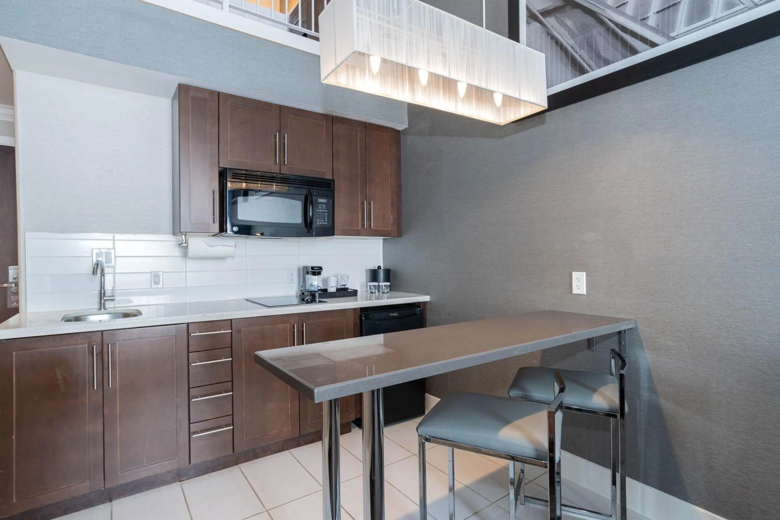 Kitchen or kitchenette in Sandman Signature Edmonton South Hotel