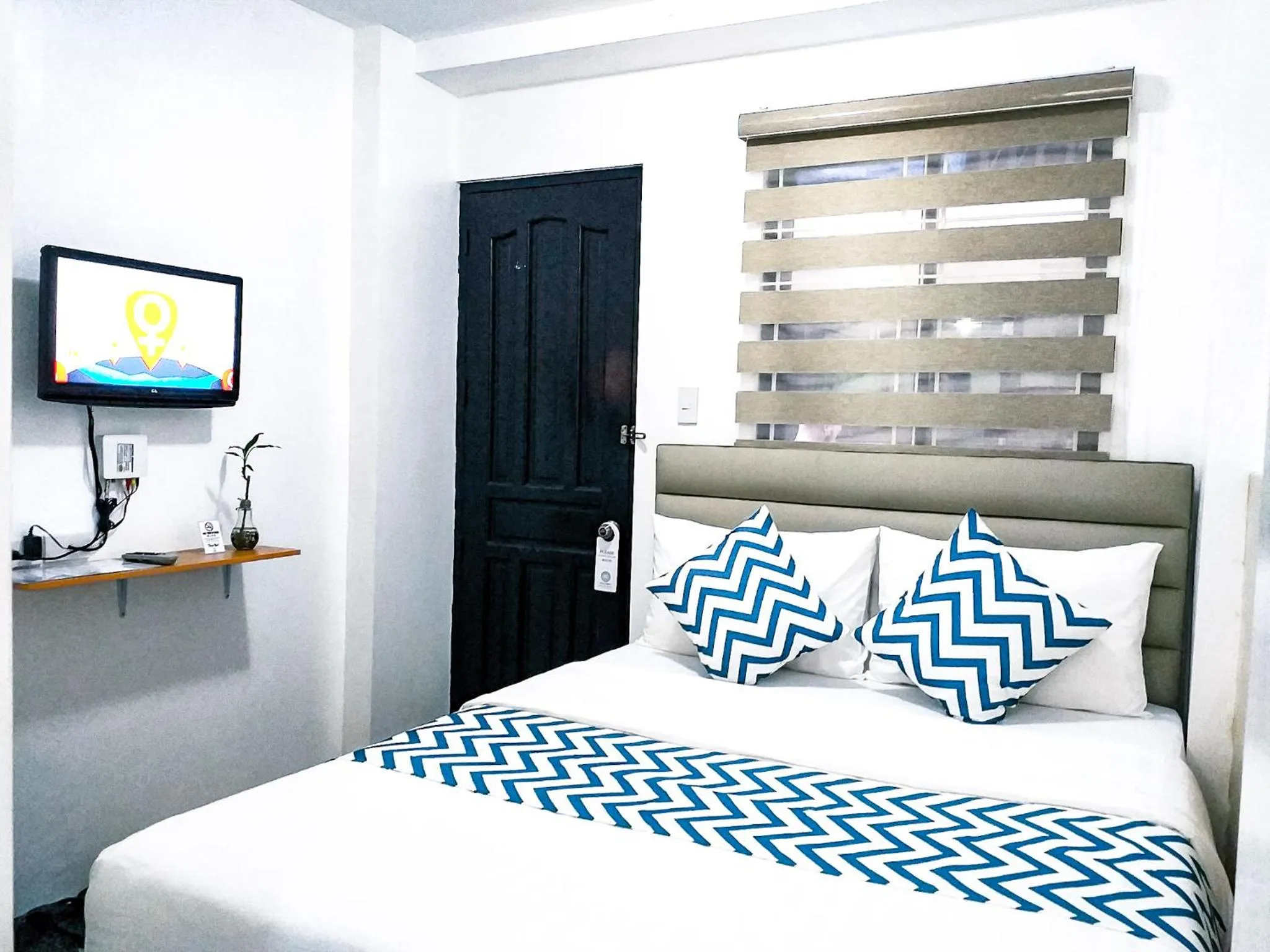 Bed in Grand Blue Beach Hotel