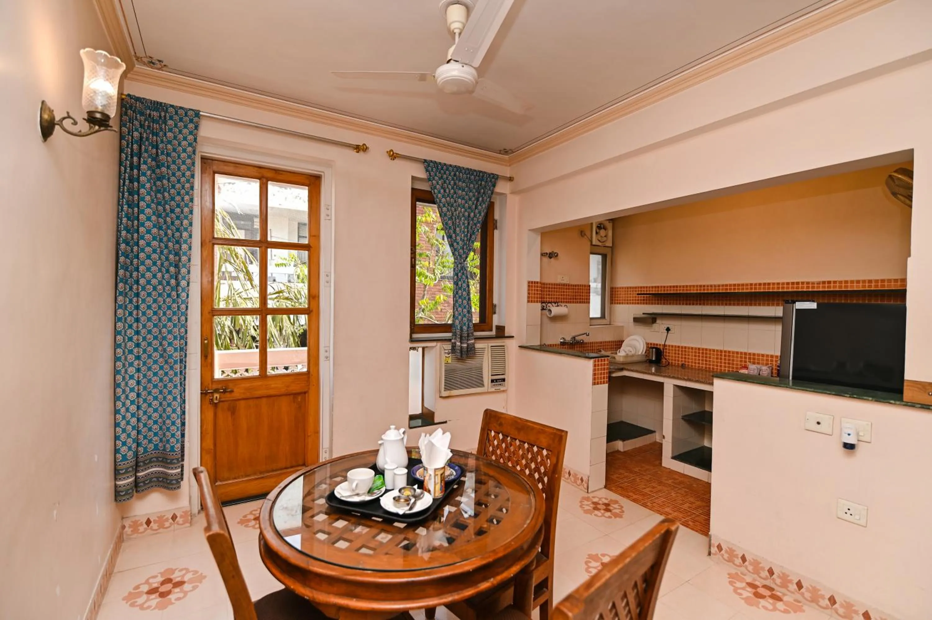 Kitchen or kitchenette in Om Niwas Suite Hotel