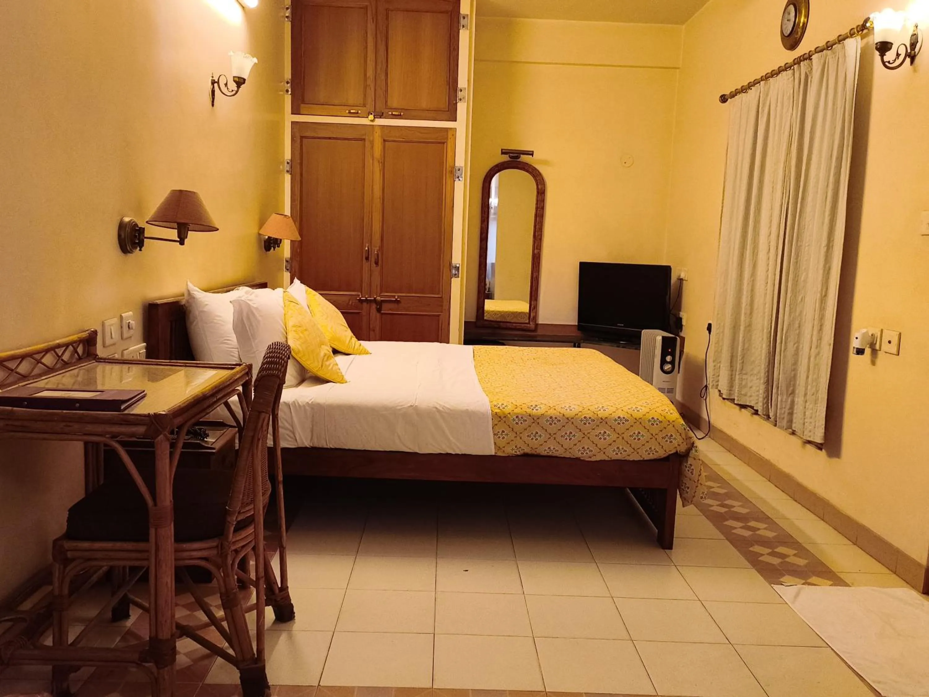 Bed in Om Niwas Suite Hotel