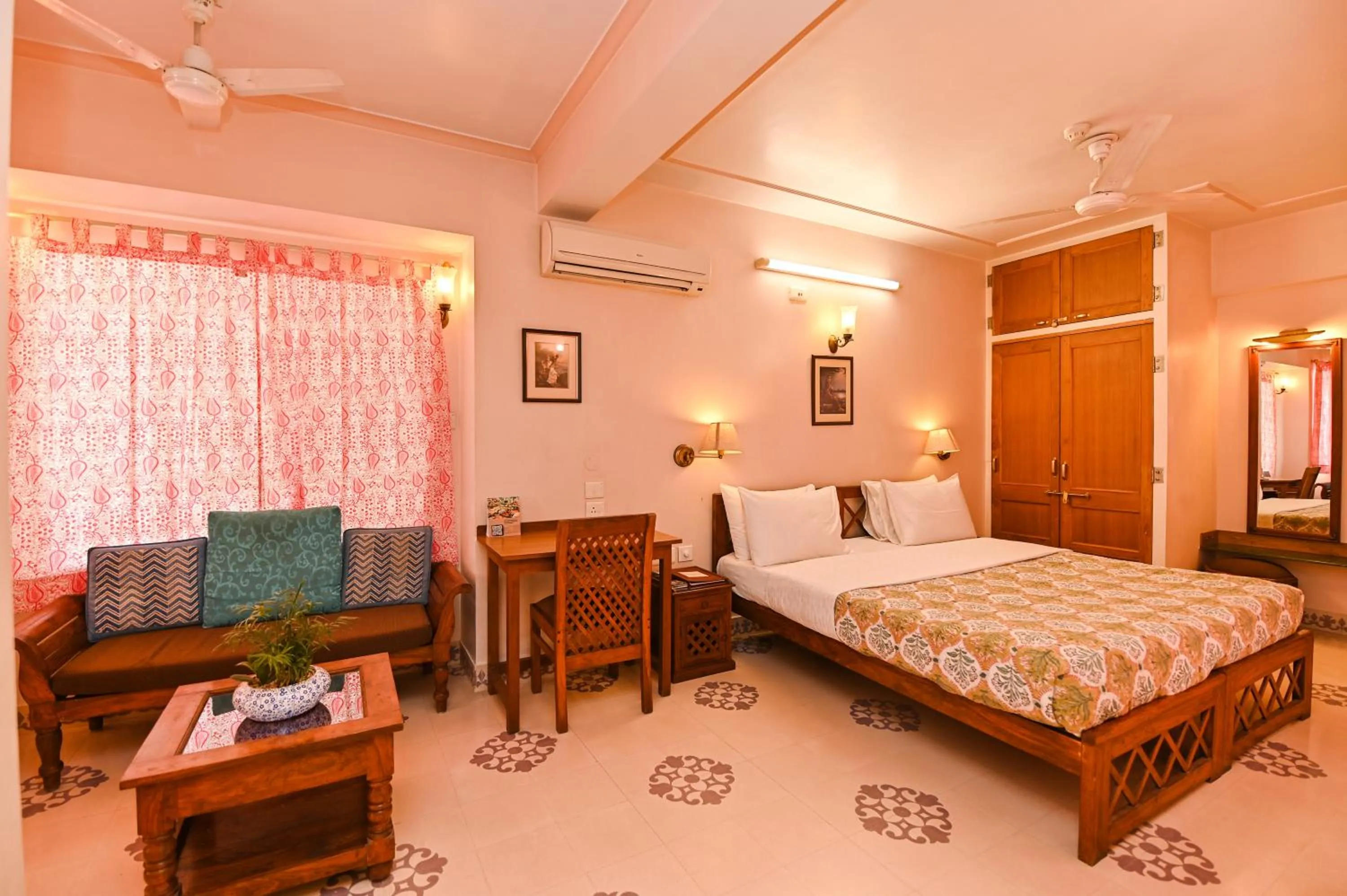 Bed in Om Niwas Suite Hotel