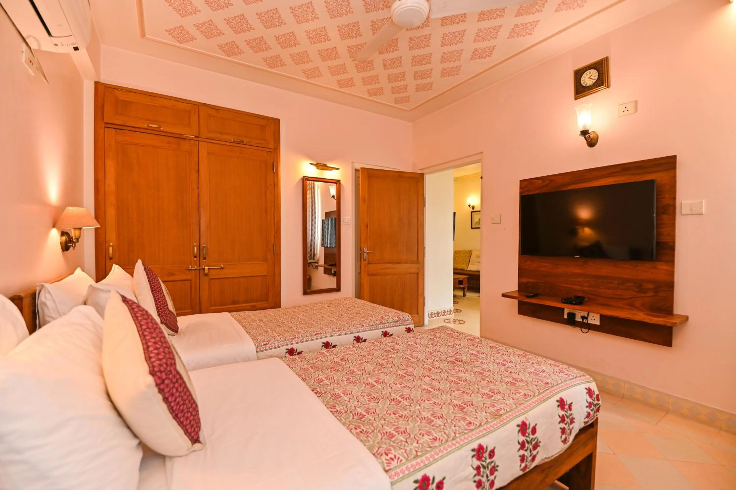 Bed in Om Niwas Suite Hotel