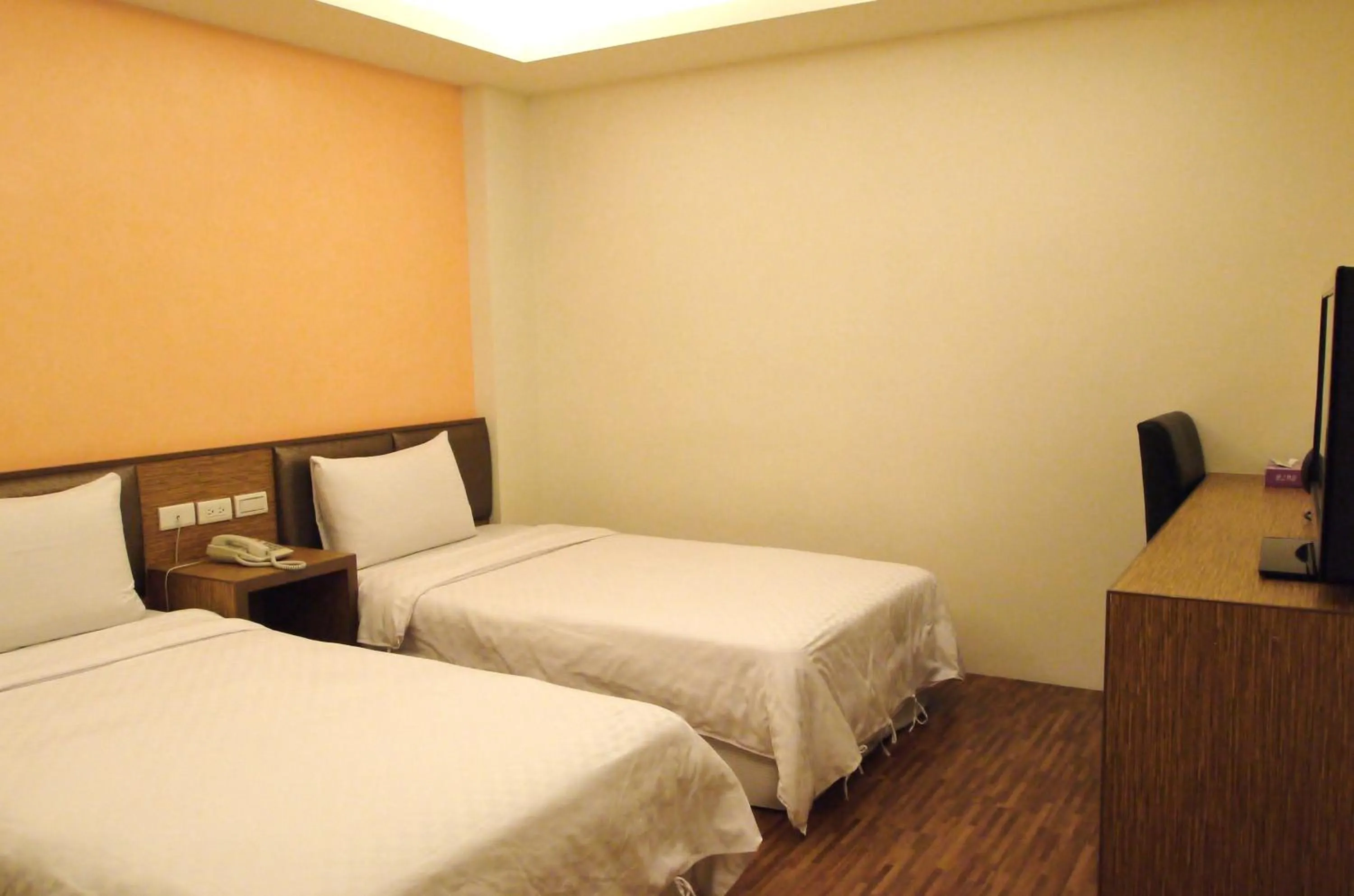 Bed in Jinbao Hotel