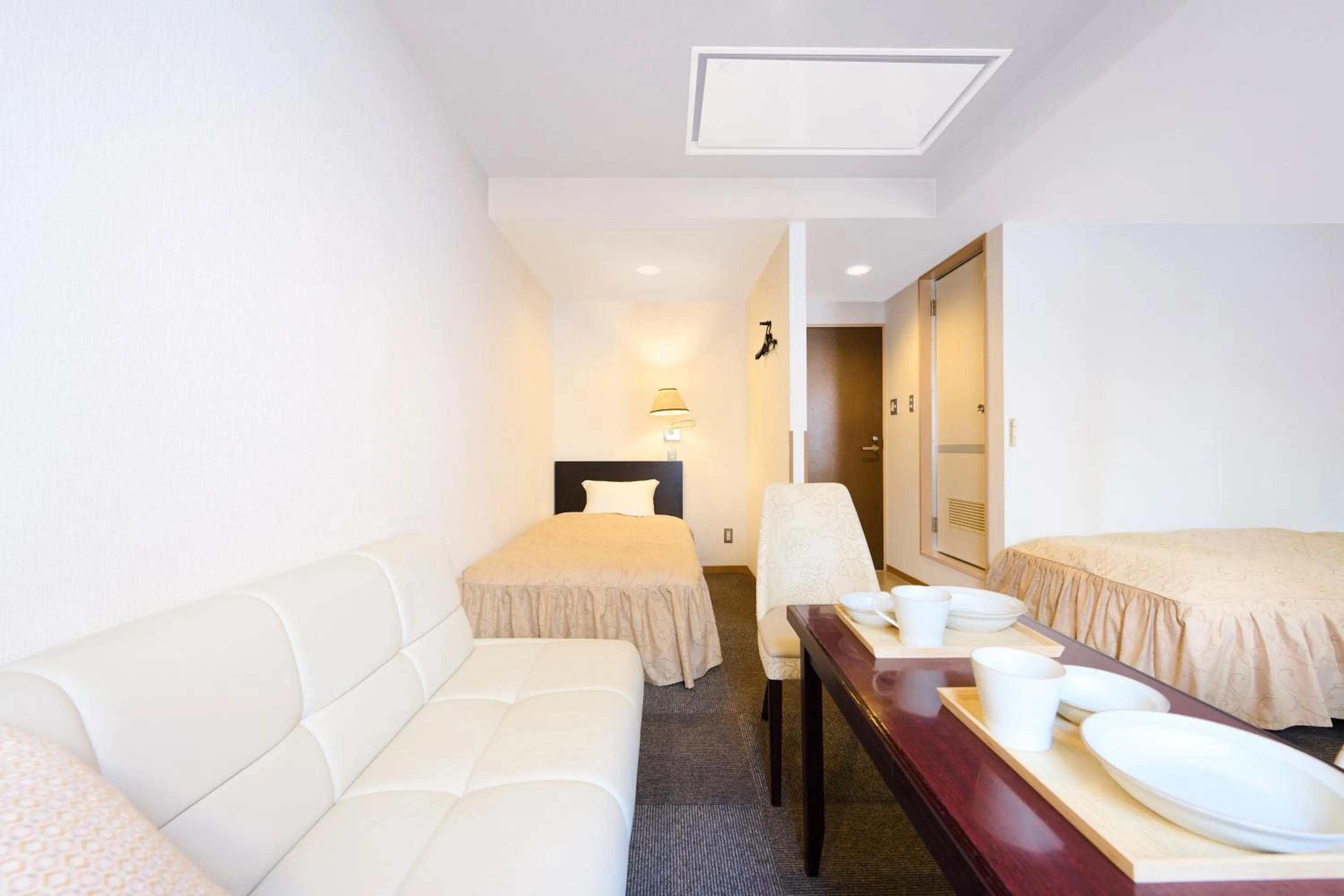 Bed in Hotel Sho Sapporo