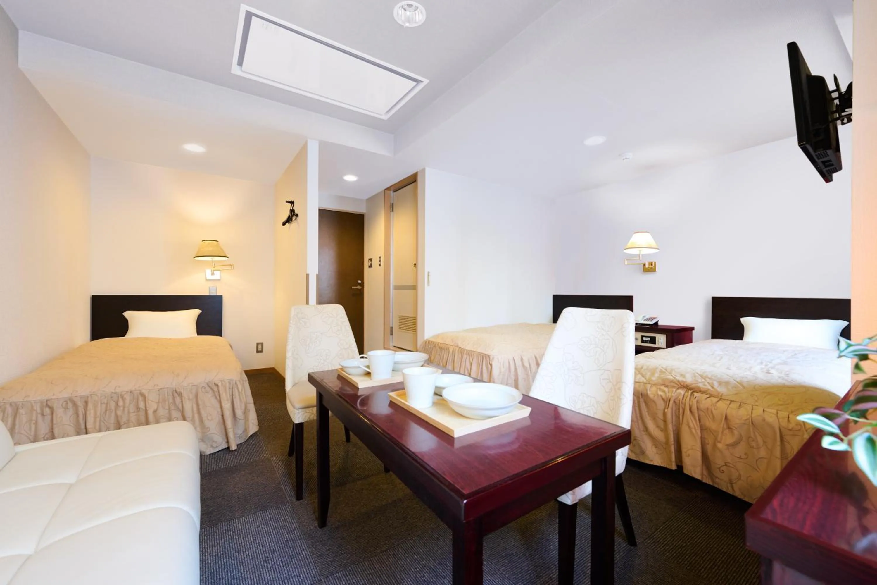 Bed in Hotel Sho Sapporo