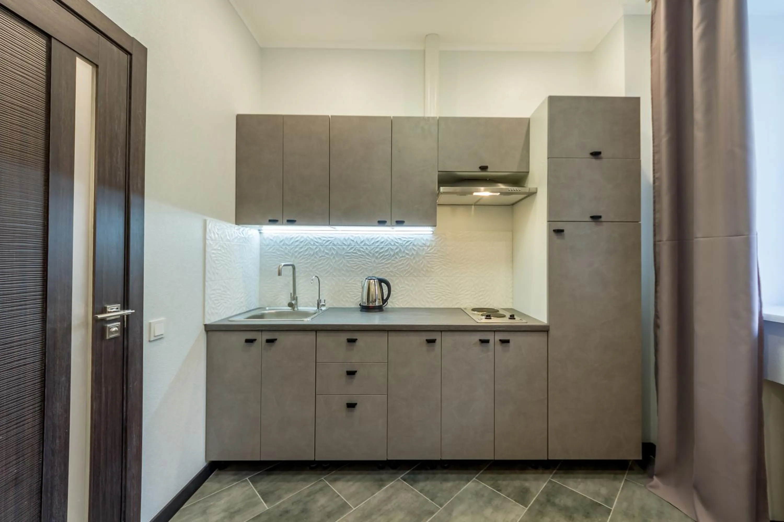 Kitchen or kitchenette in Central Dayflat Apartments