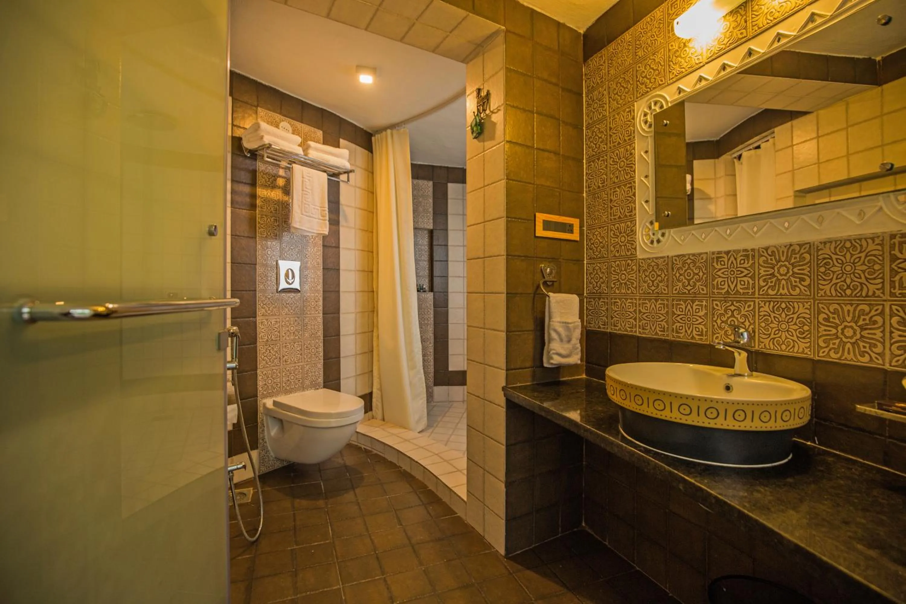 Bathroom in Nirali Resorts