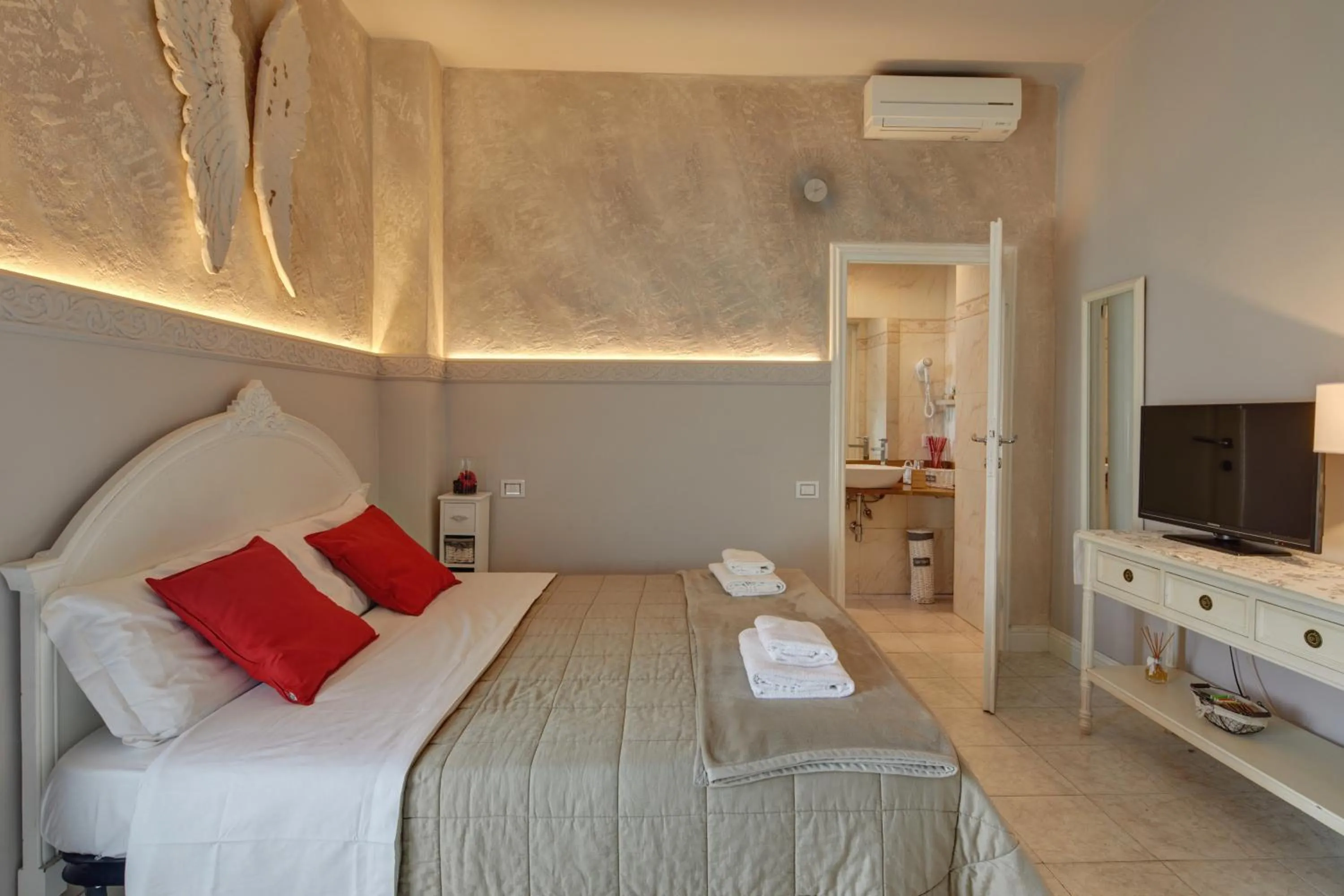 Bed in Leone X Guest House